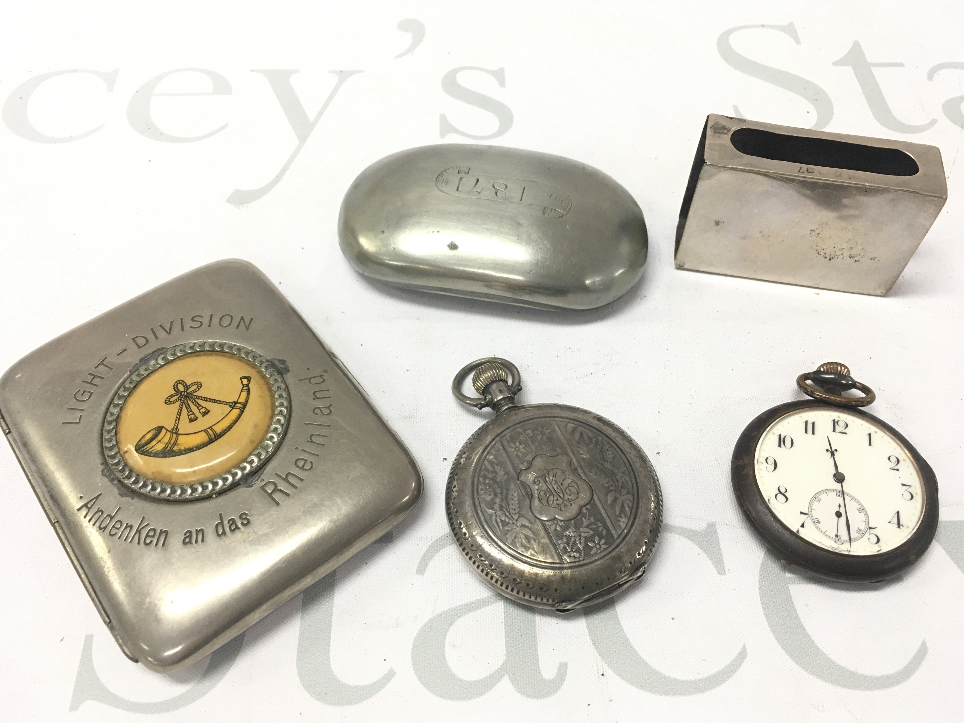 A WW1 British Light Division cigarette case, a late Victorian Snuff box marked 1871 , silver hallmarked horse design matchbox holder, silver match box holder, silver cased pocket watch . Postage category B