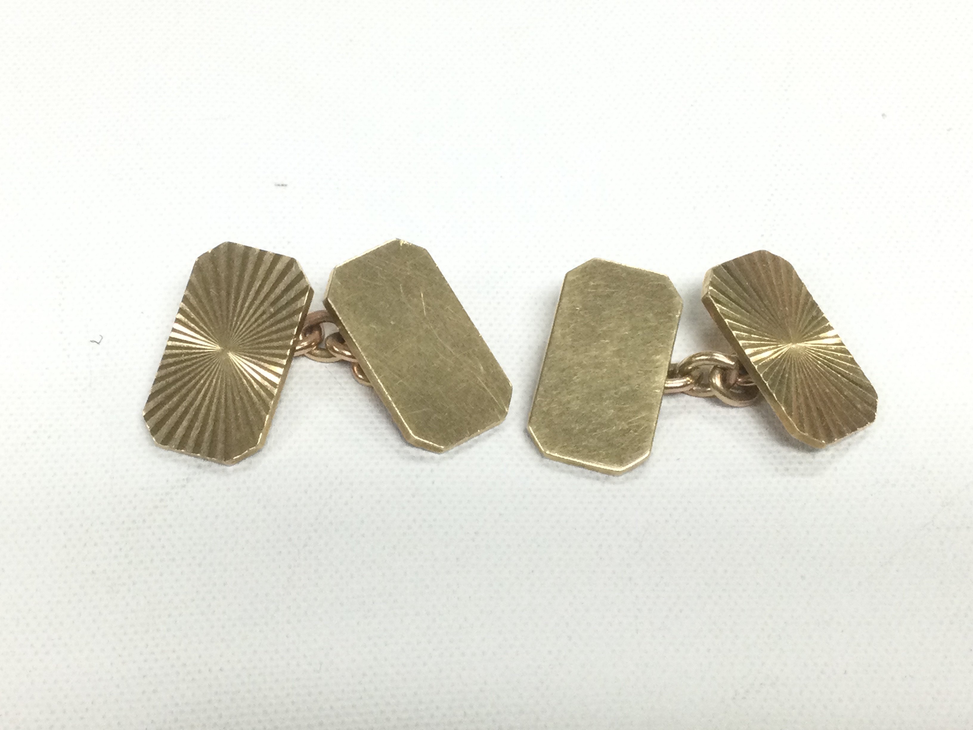 A pair of 9ct gold cufflinks, approx 10g. Shipping category A.