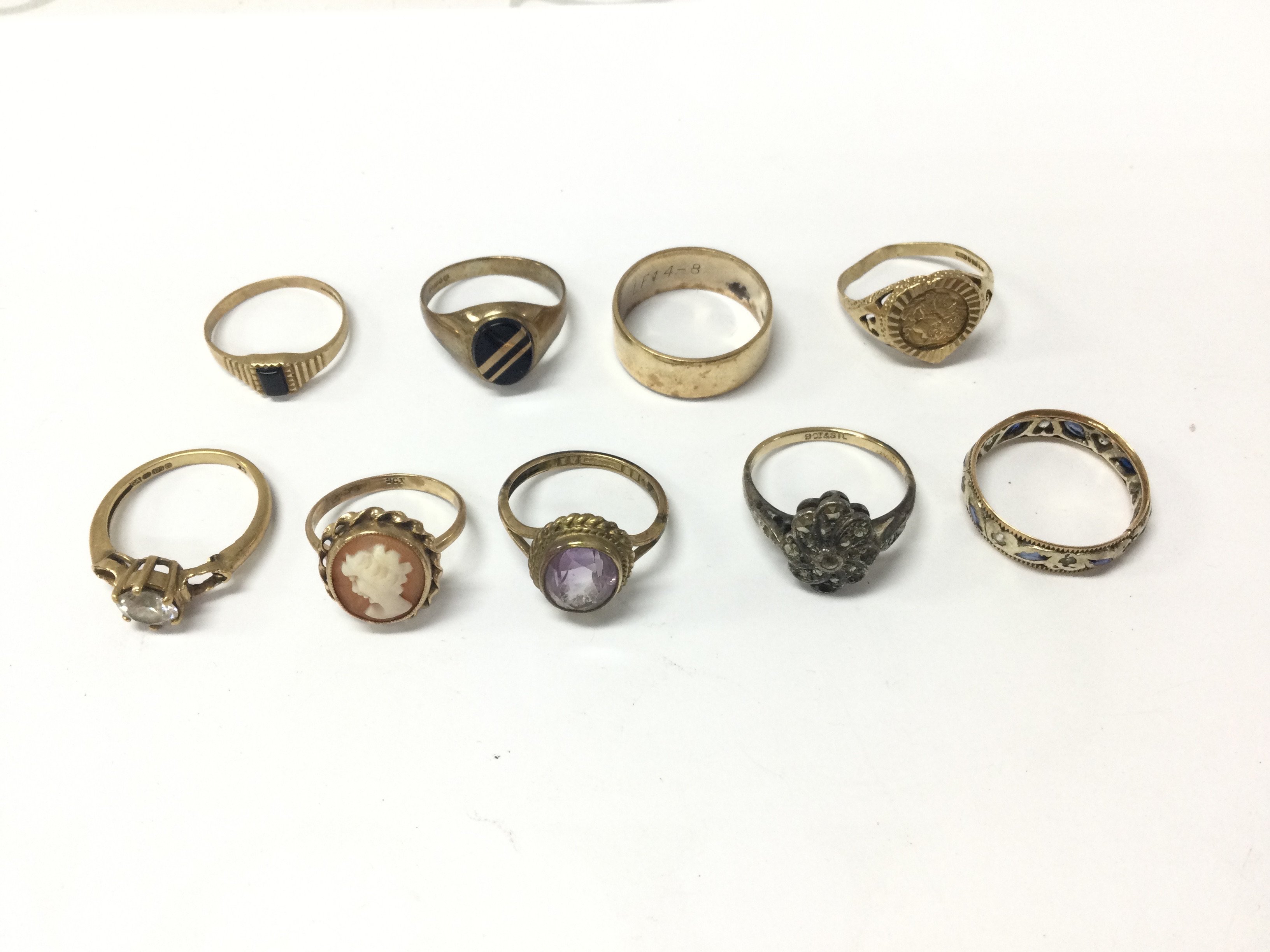 A collection of assorted 9ct gold rings. 23.28g Postage B