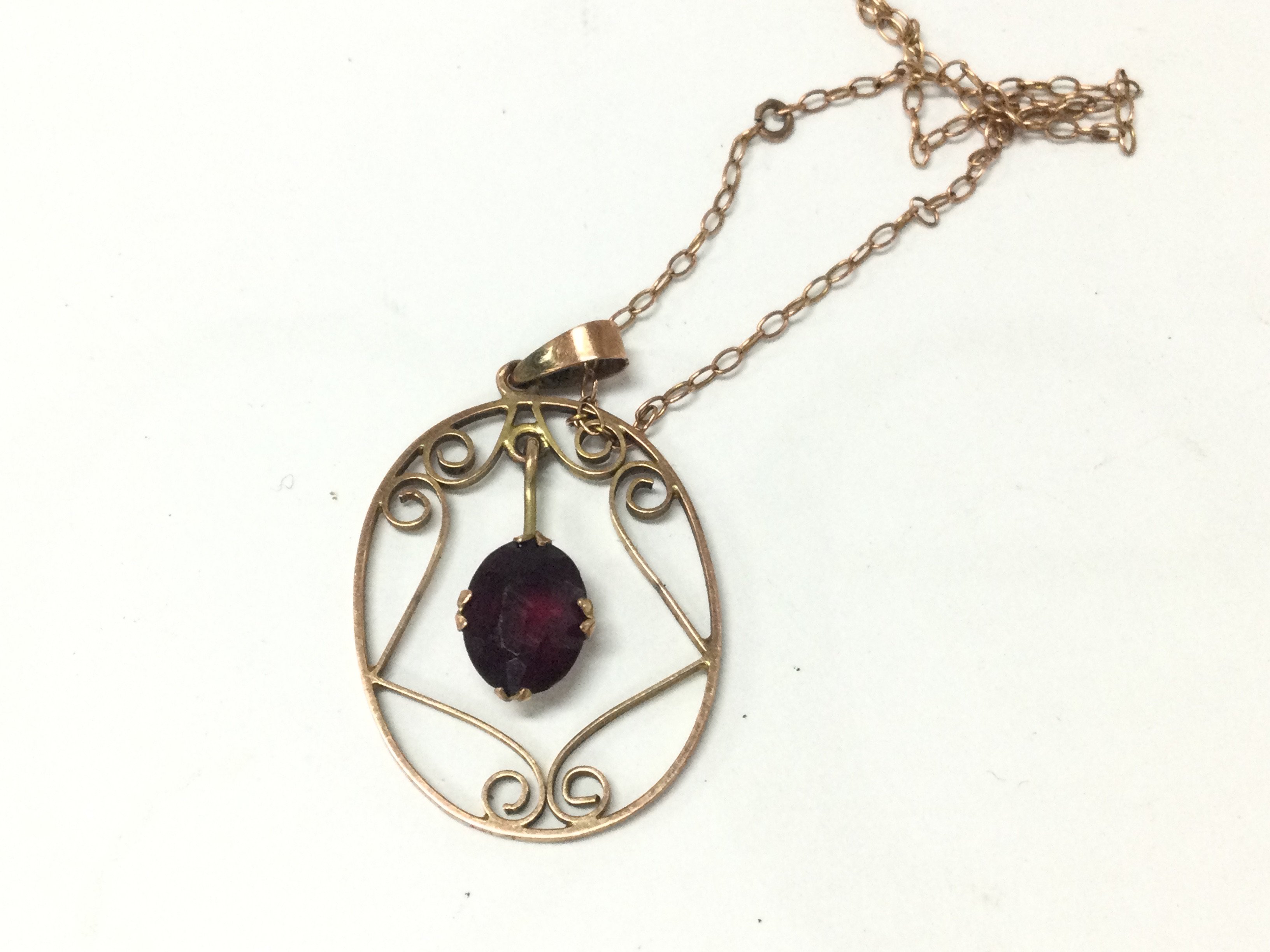 A gold pendant on chain. 2.26g Postage A