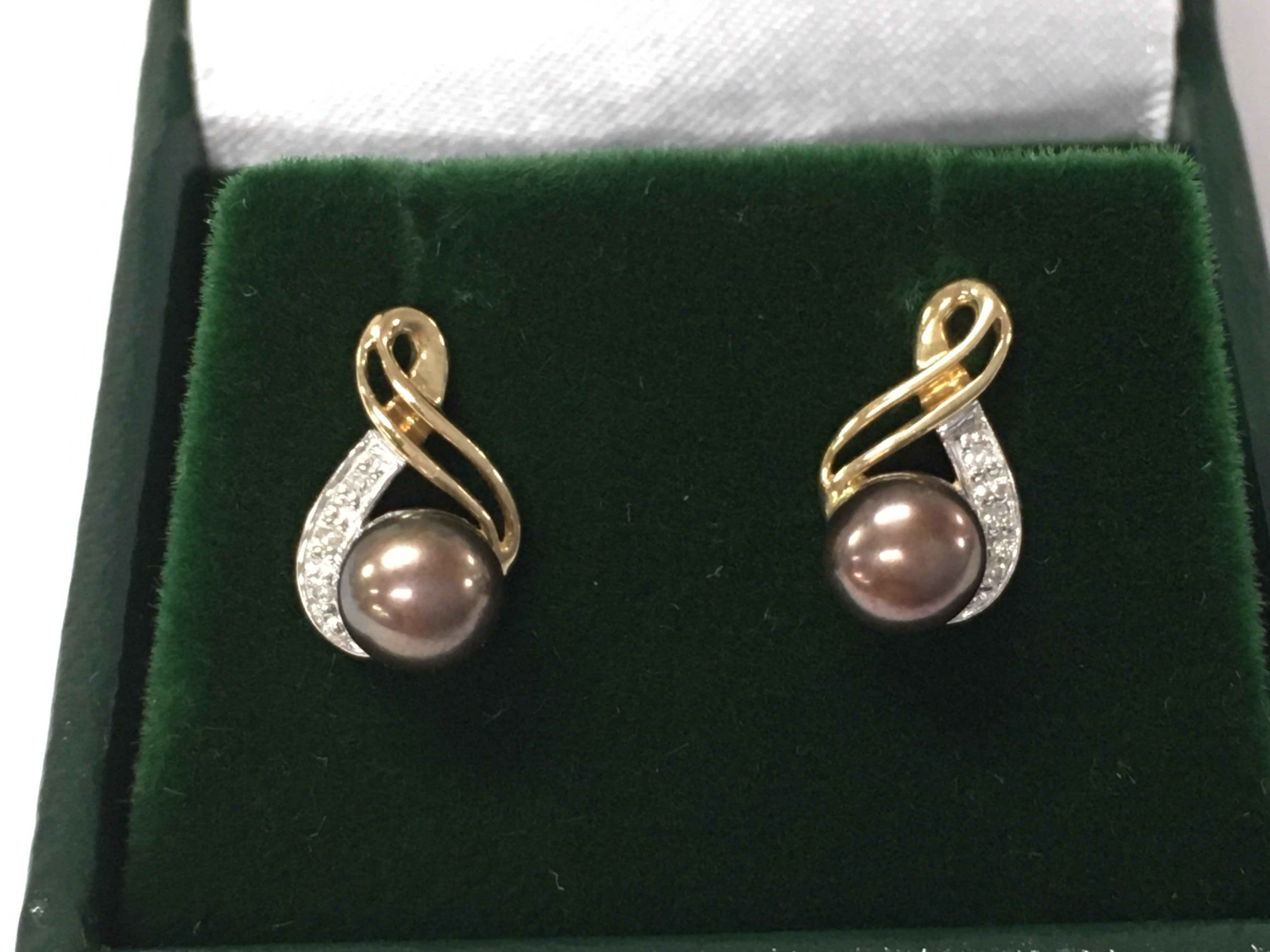 A pair of 9ct yellow gold purple/grey pearl and diamond infinity style earrings.