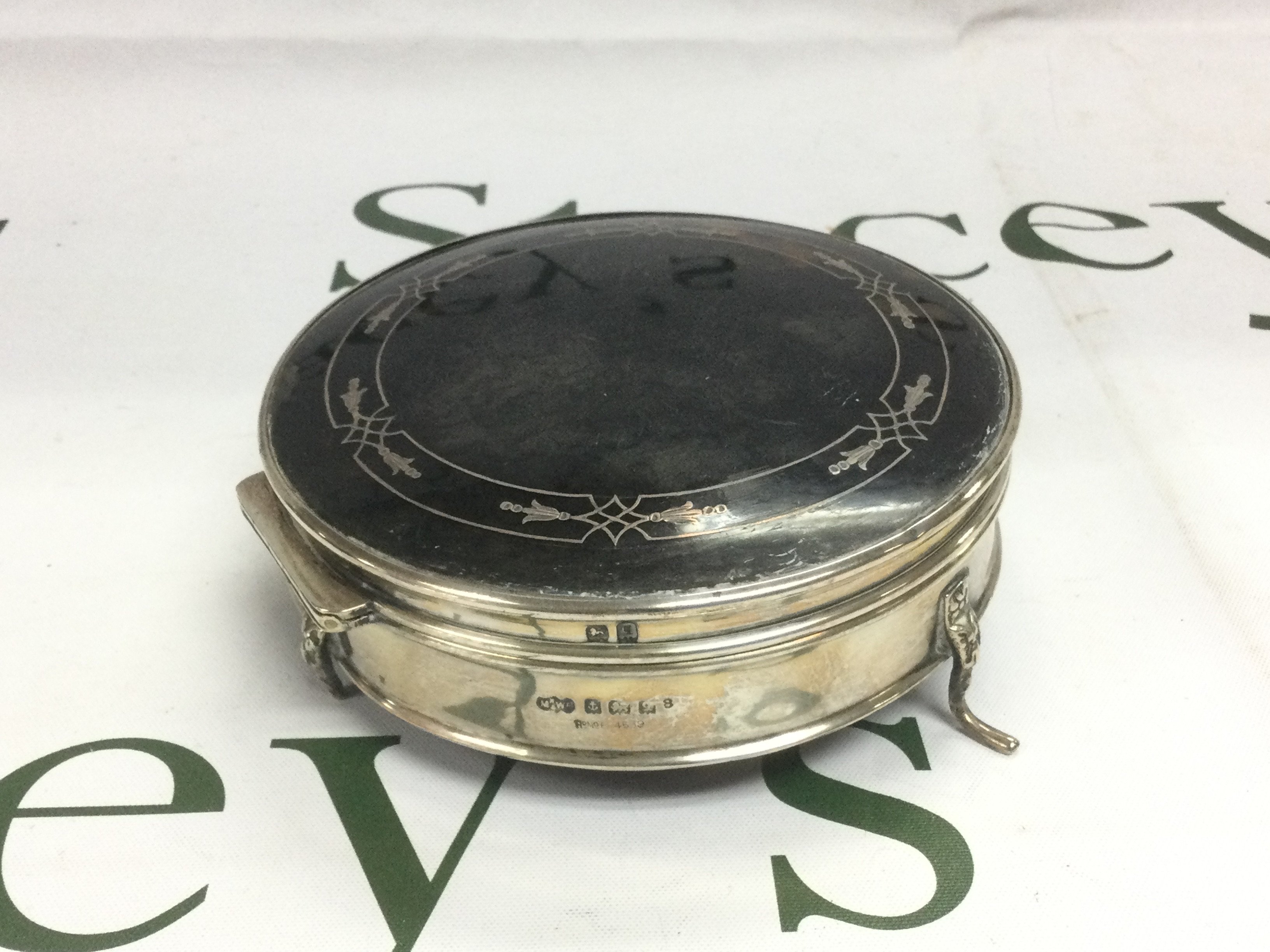 A silver lidded circular box, Birmingham hallmarks, approx width 12cm. Shipping category B.