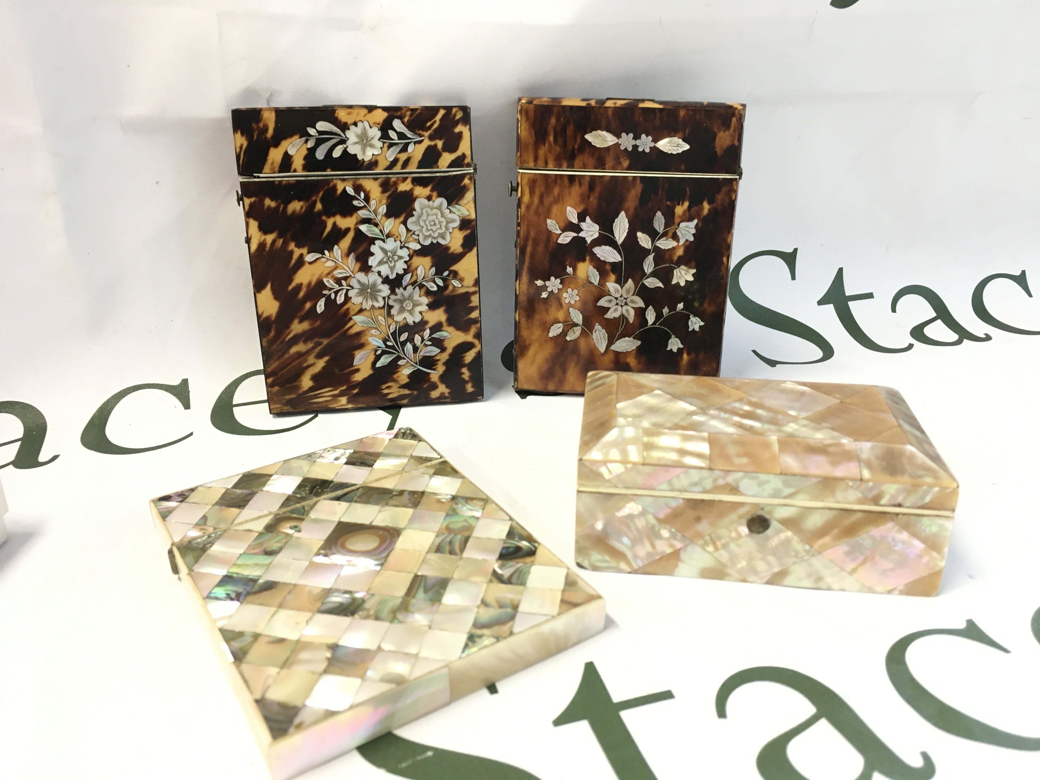 Three card cases and a trinket box ,tortoiseshell and mother of Pearl. Postage catB