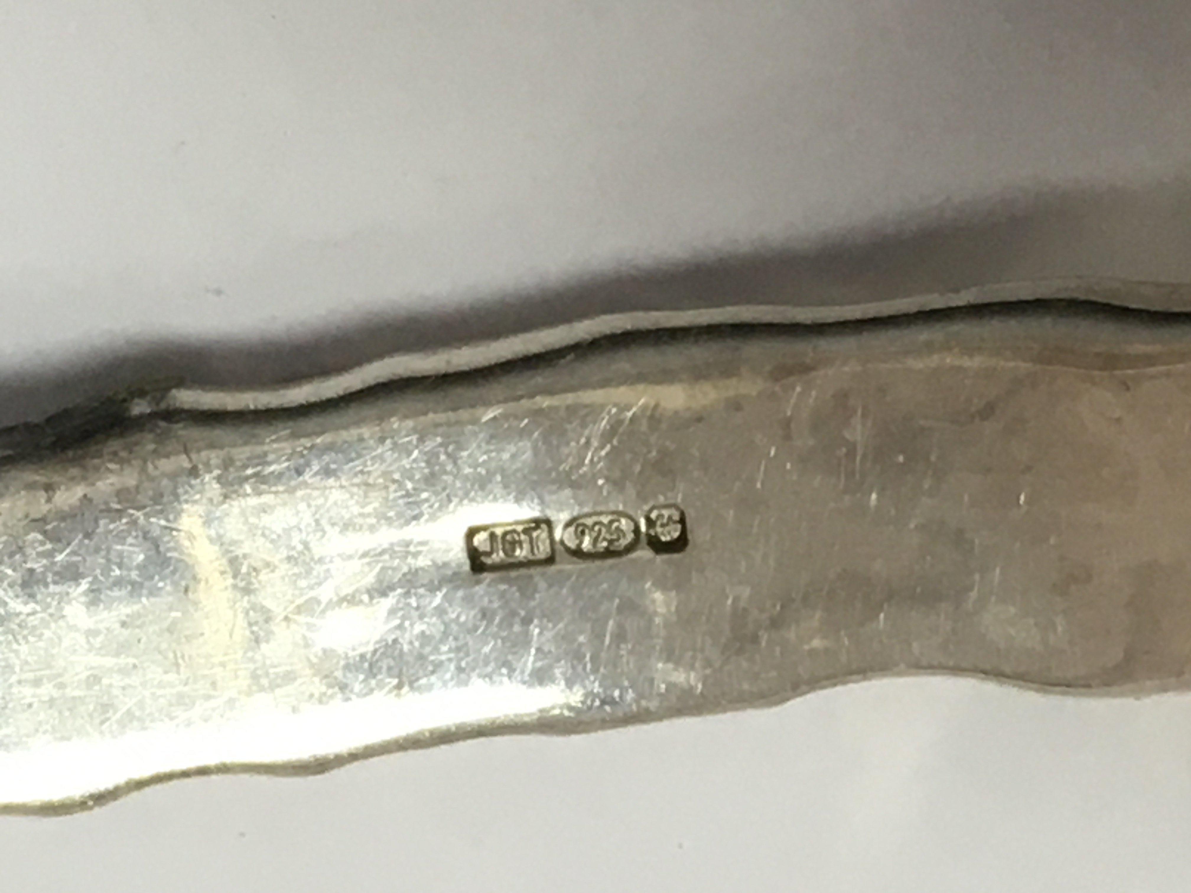 A silver bangle , 22.5g total weight. Postage category A- NO RESERVE