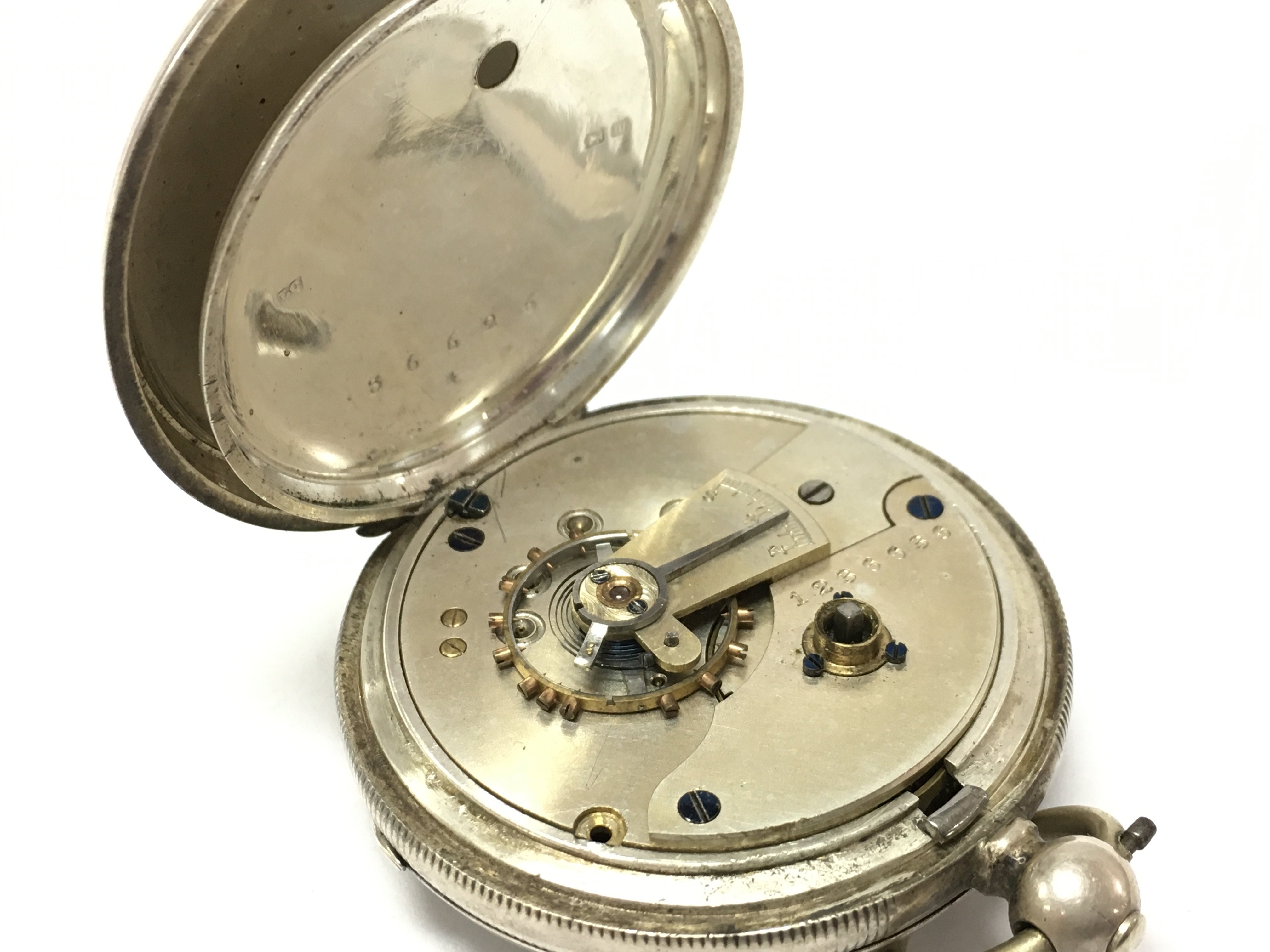 A hallmarked silver pocket watch, seen working. Postage category A