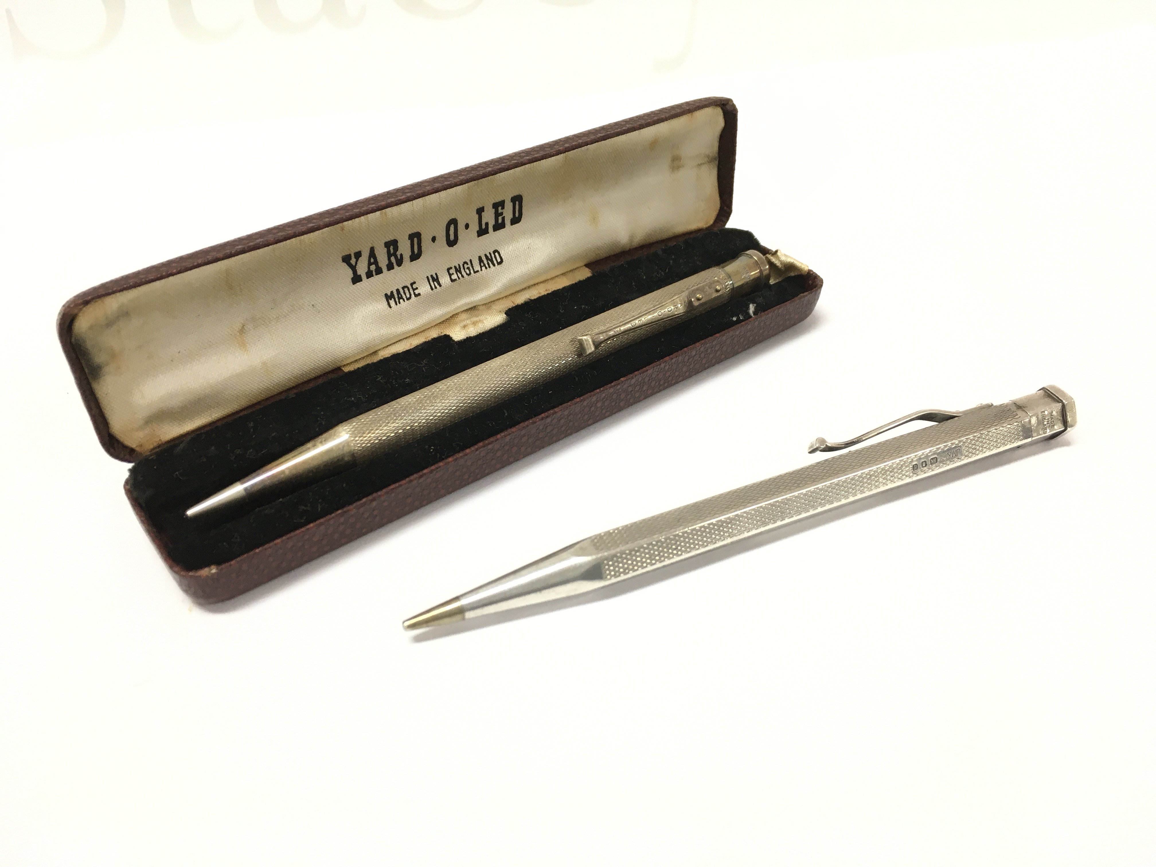 Two silver Yard O Led pencils . Postage category A