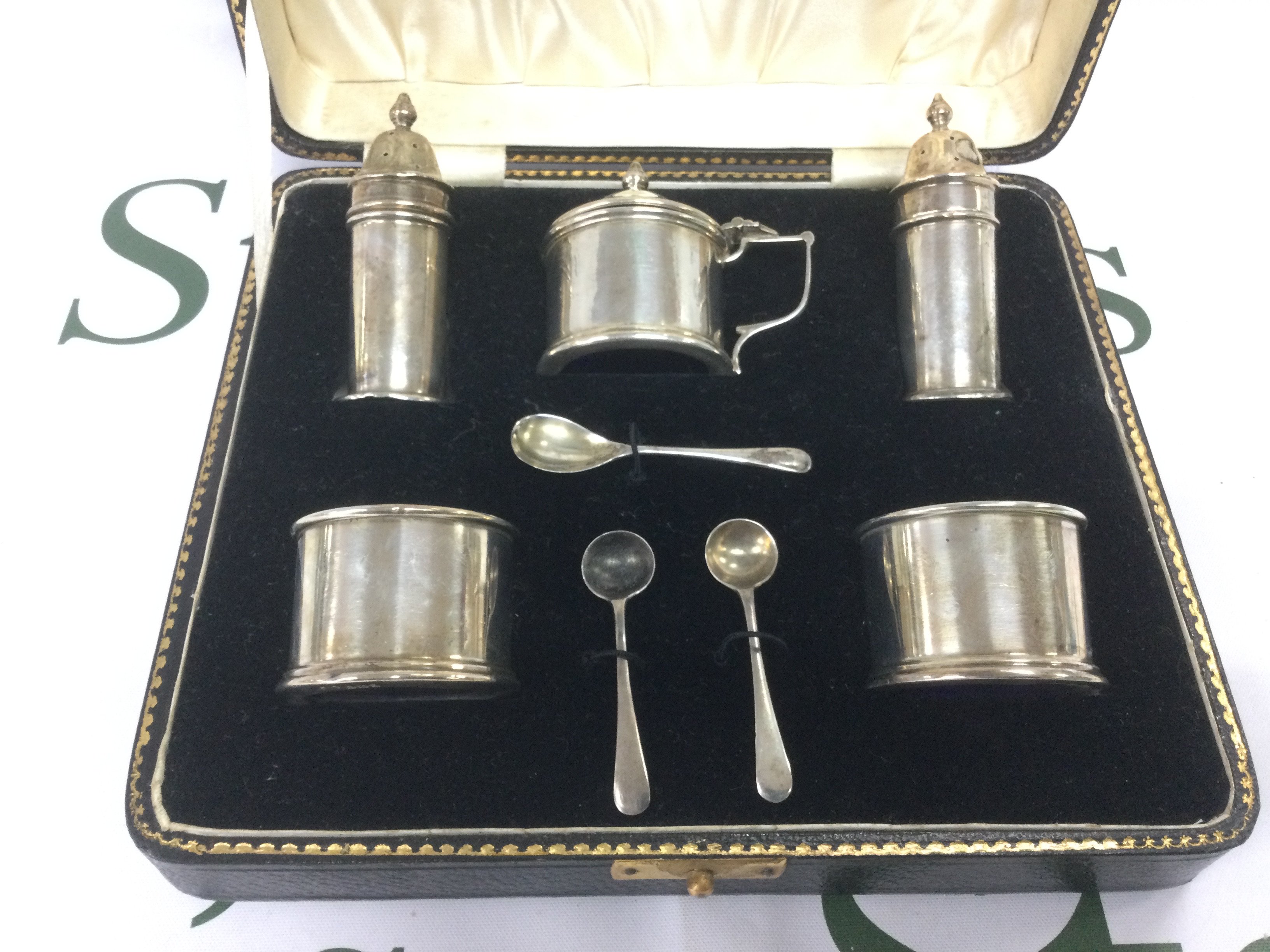 A cased silver cruet set, Birmingham hallmarks. Shipping category B.