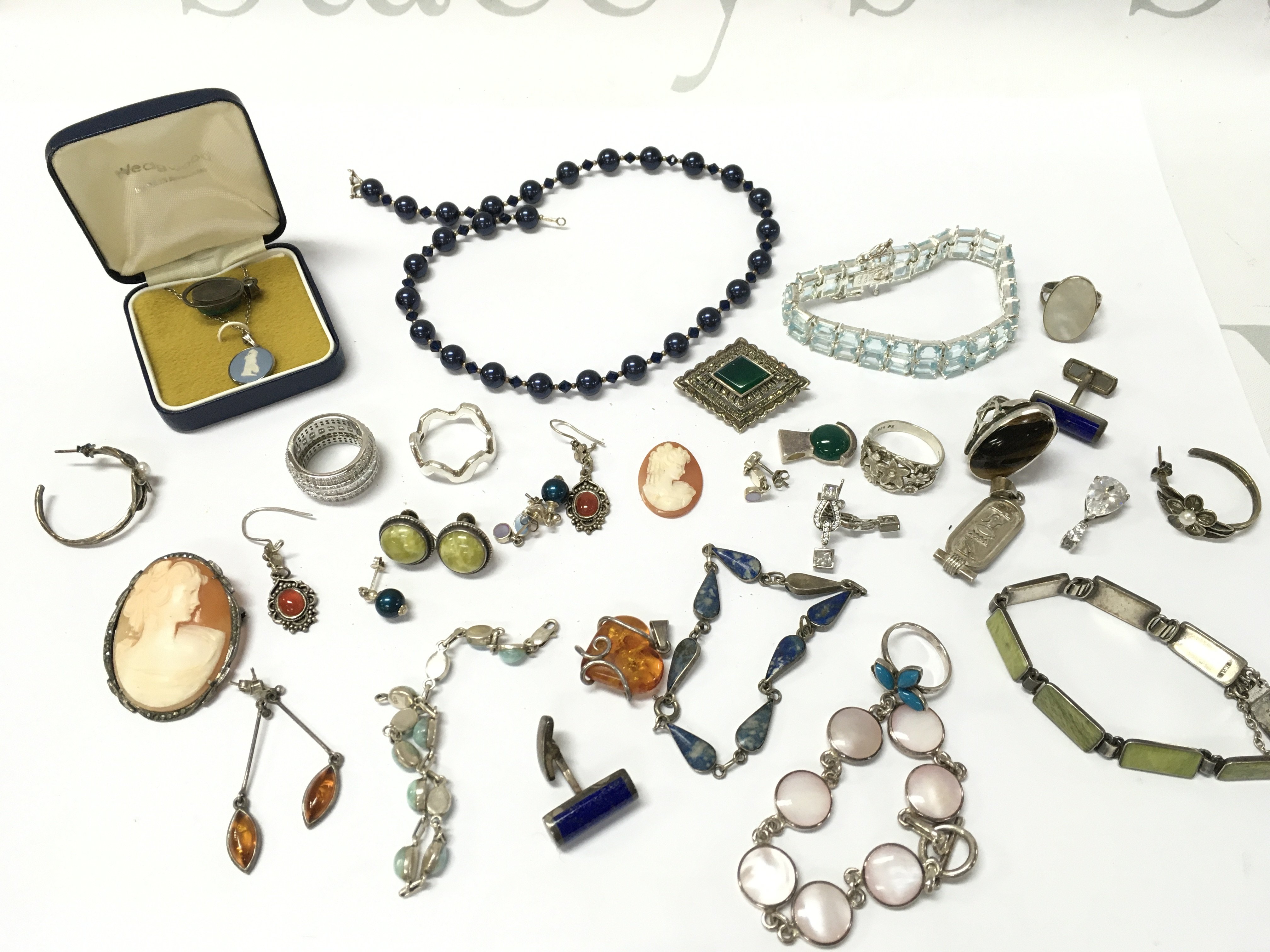 A collection of silver jewellery including earrings, bracelets, rings etc. Postage category B