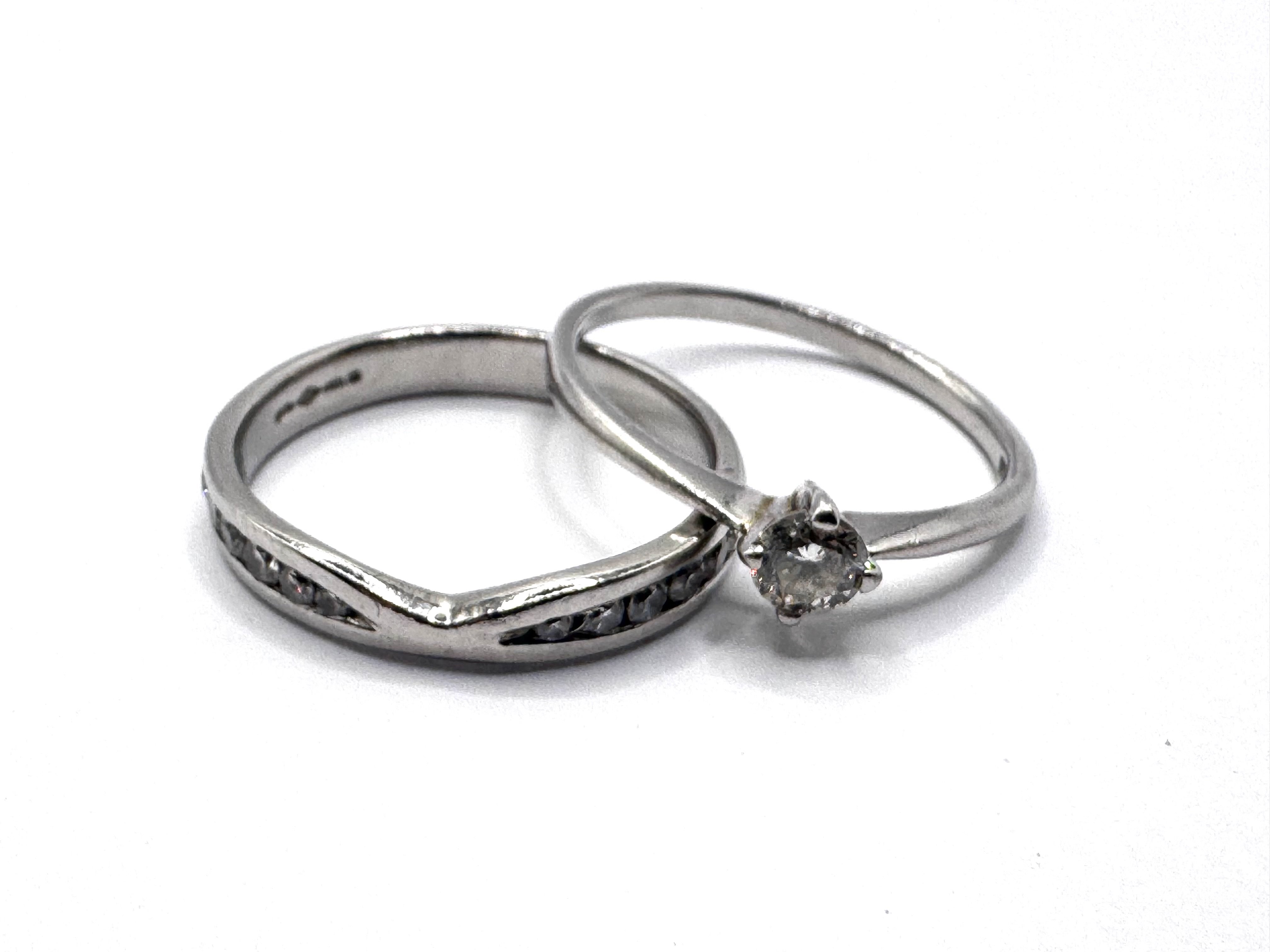 A 950 Platinum 0.25ct solitare diamond ring together with a diamond set platinum band. Size P (A)