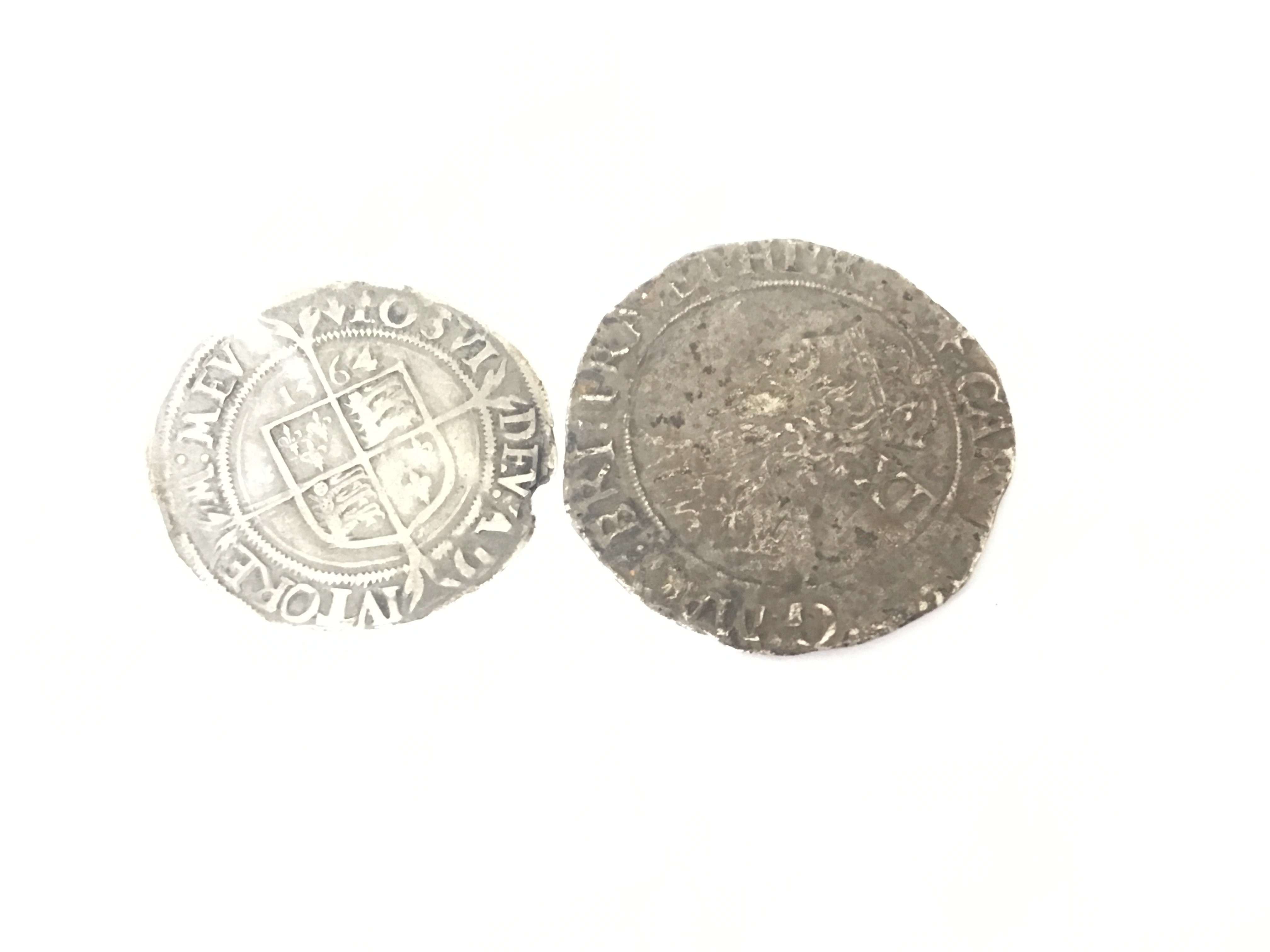 A Charles I silver shilling and a 1564 Elizabeth I silver three pence hammered coin (2)