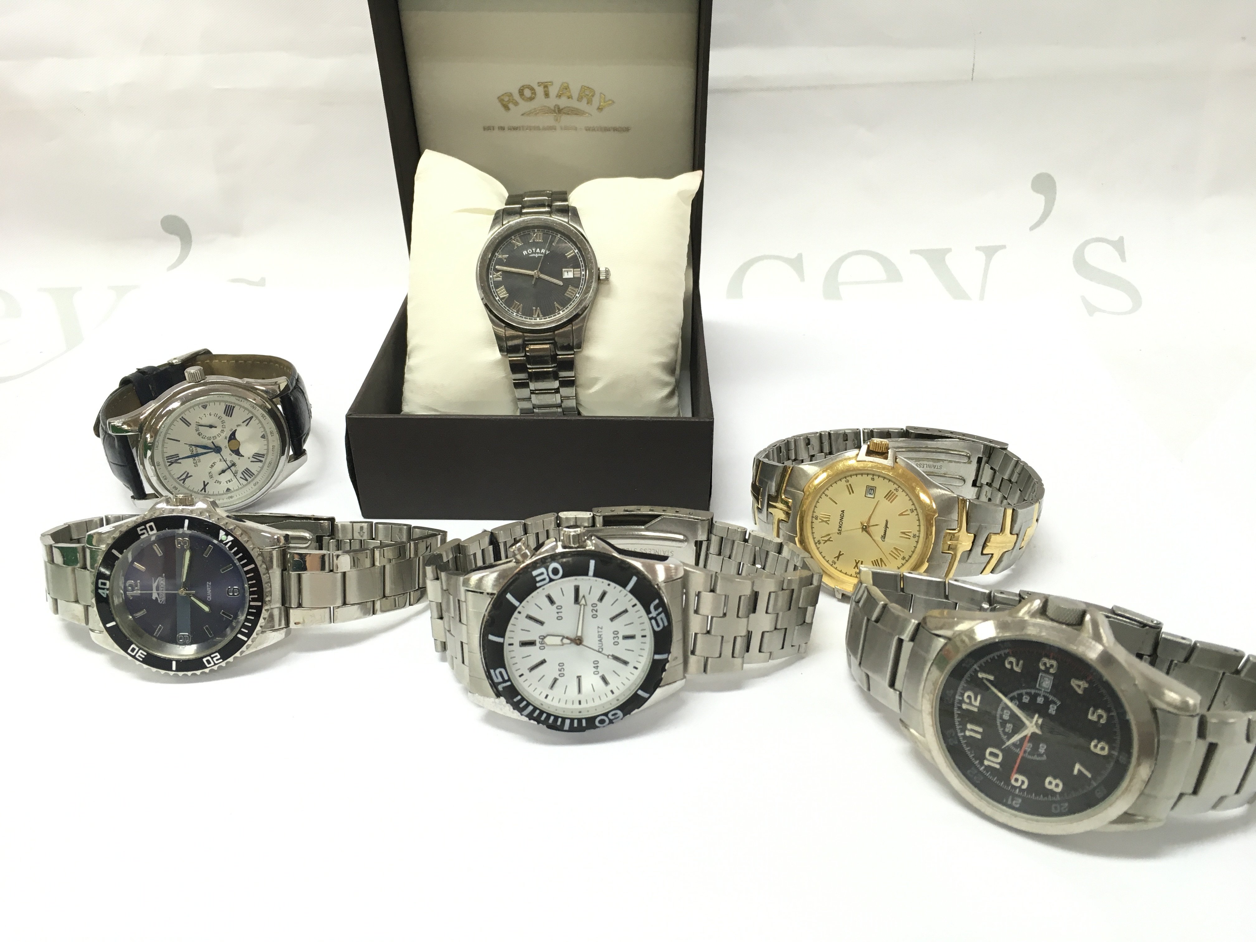 A collection of Gents watches including a boxed Rotary, Sekonda etc. postage category B