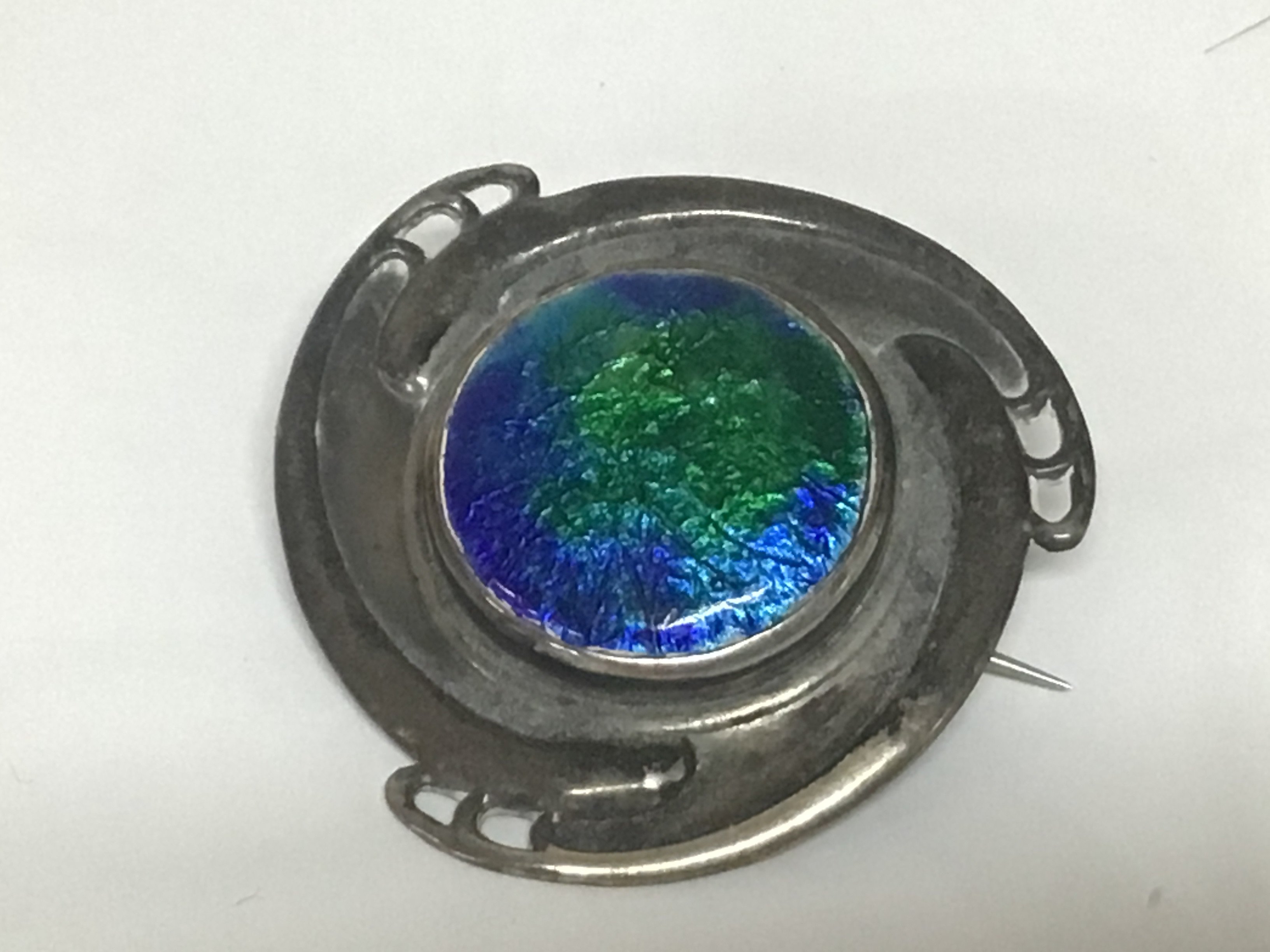 A quality Charles Horner silver brooch early 20th century of Art nouveau design and of the period the centre with bright green and blue enamel makers marks and hallmarks to the reverse.