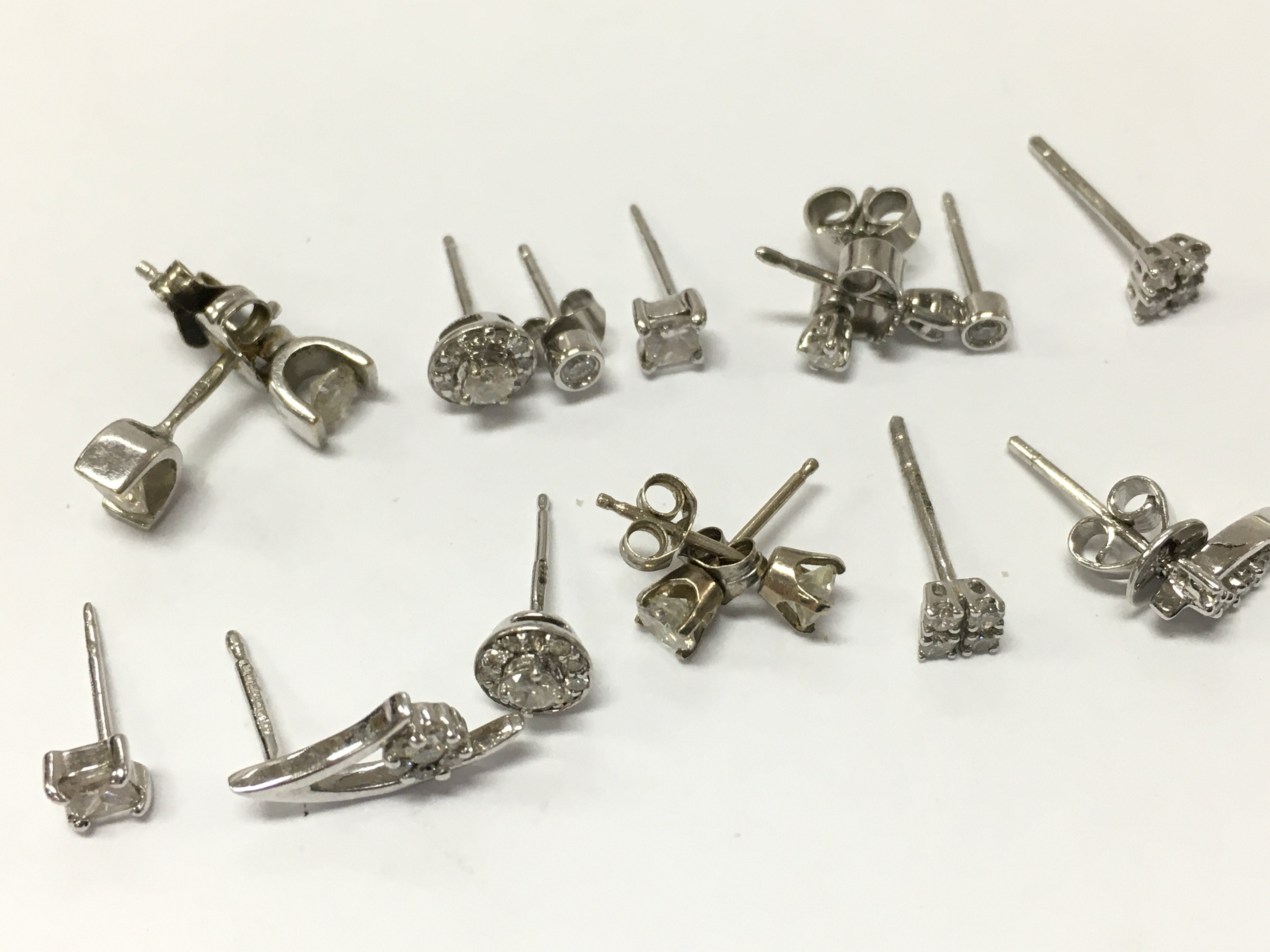 9ct white gold diamond stone stud earrings , 6.1g total weight. Postage category A