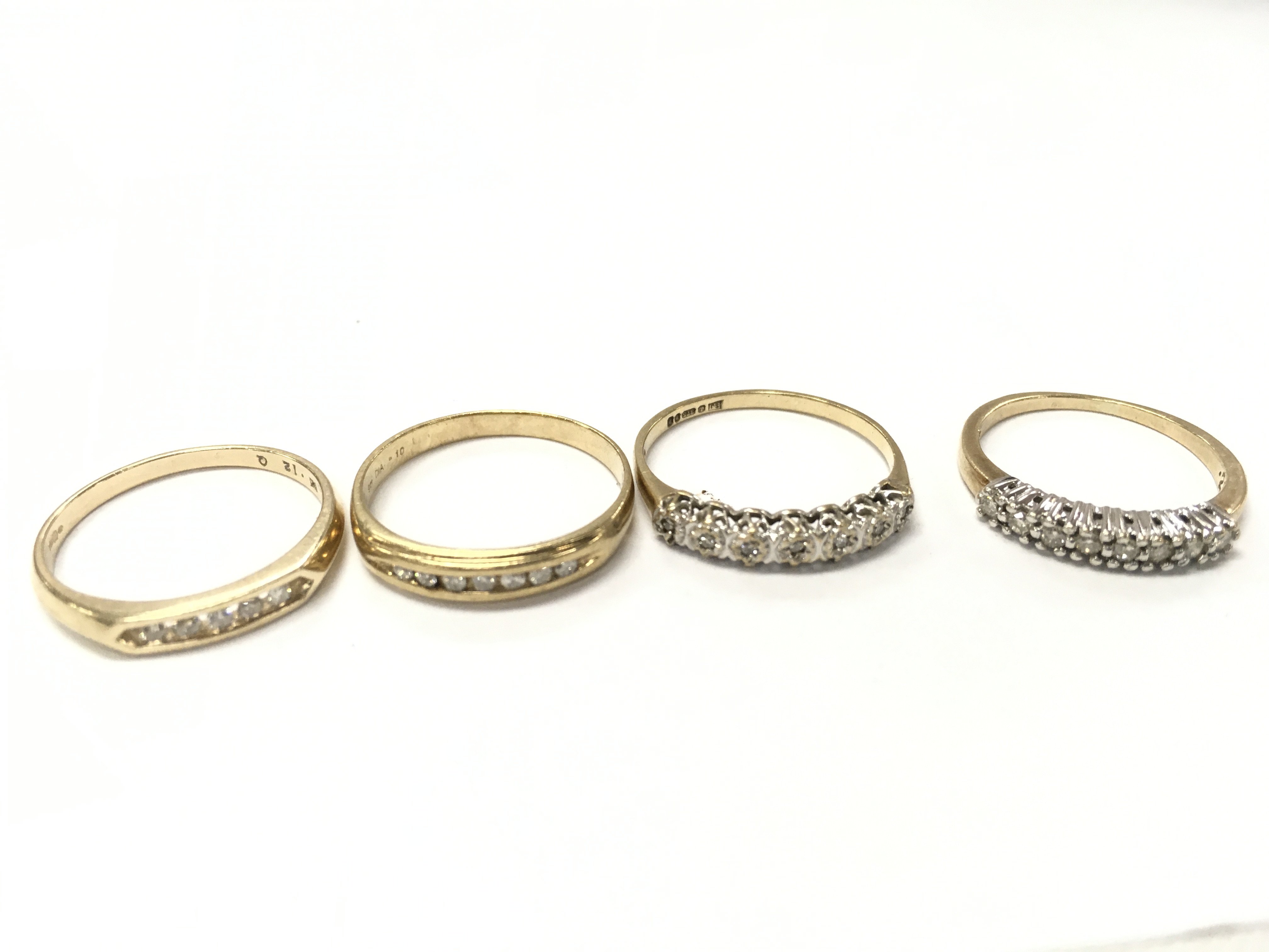 9ct gold diamond set half hoop rings, 6.4g total weight. Sizes M/L, K/L and O Postage category A