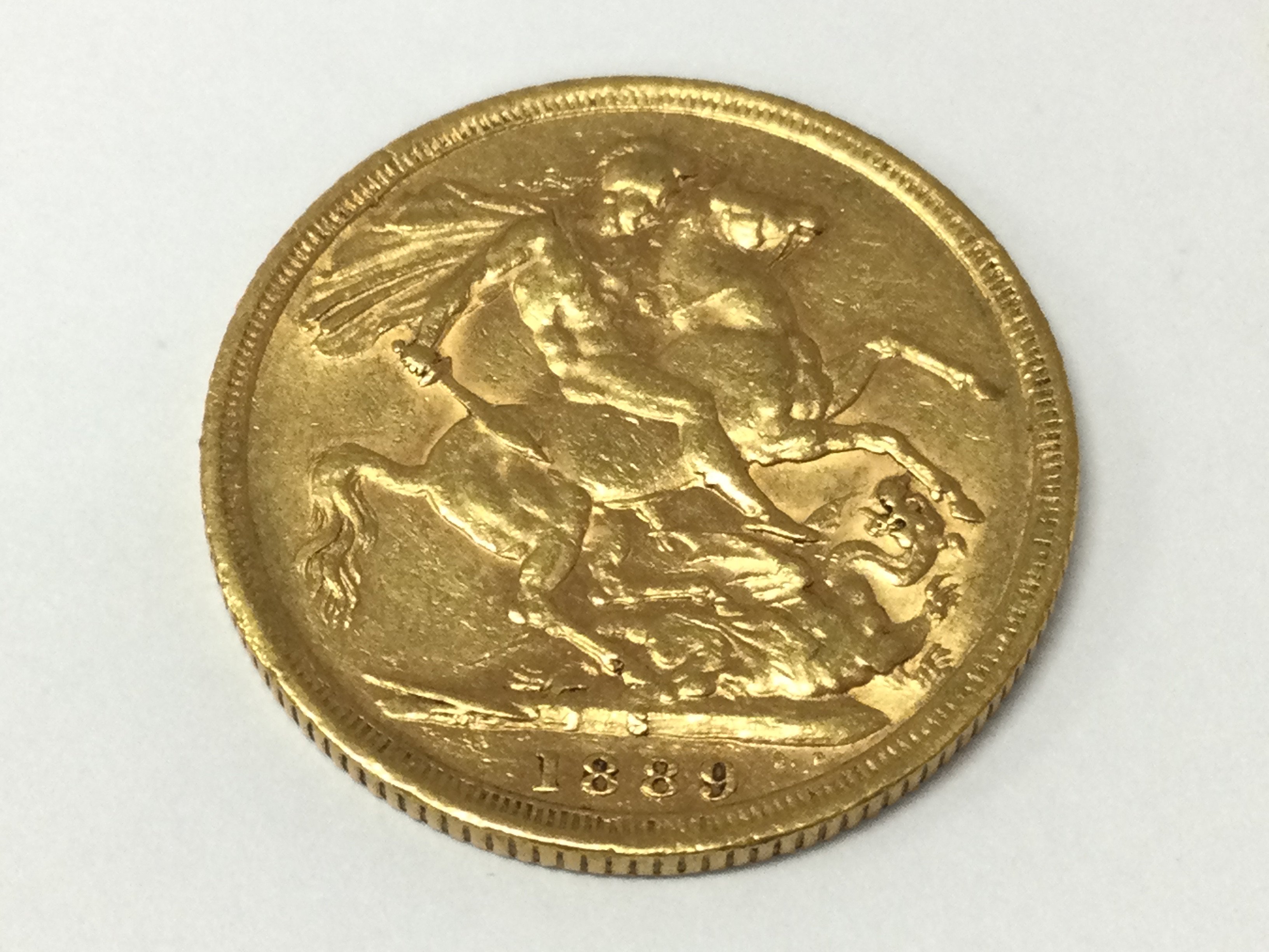 A 1889 full sovereign with Sydney mint mark.