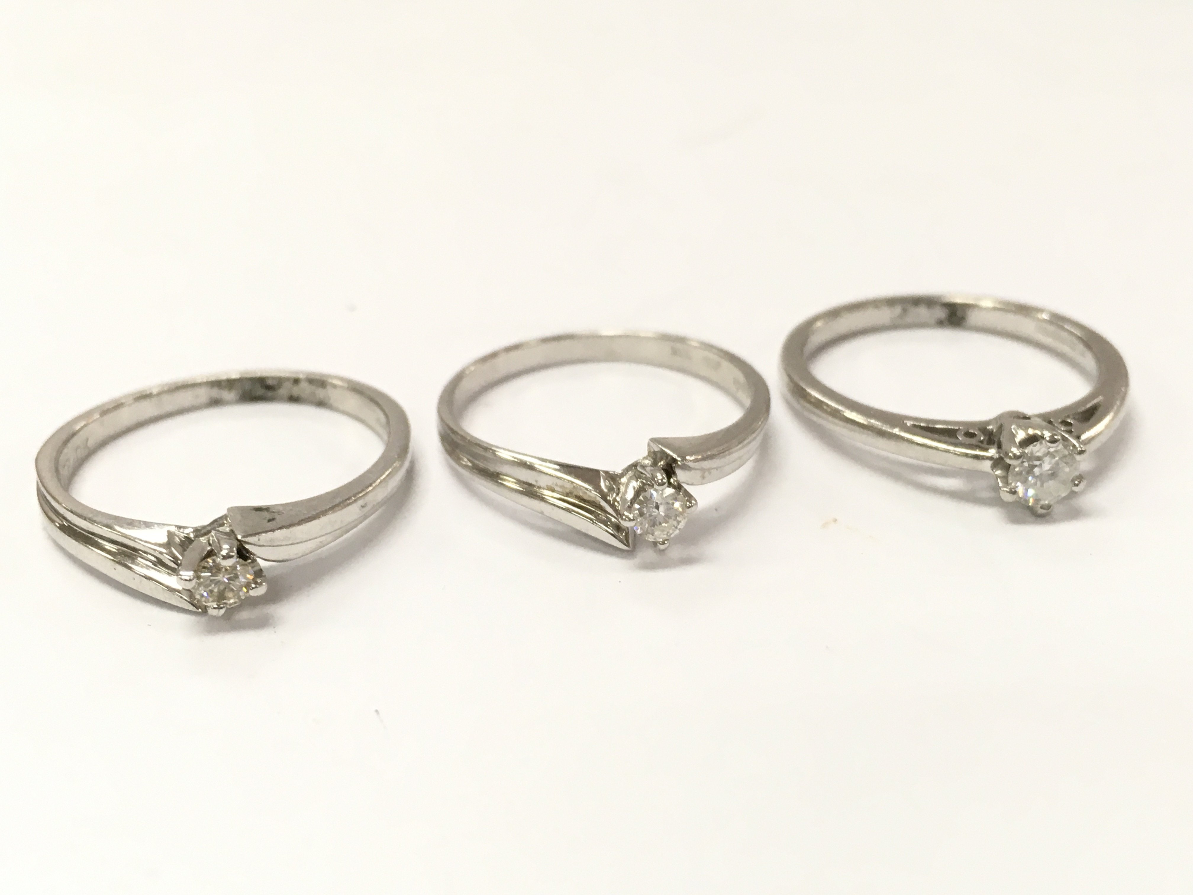 9ct white gold diamond solitaire rings , 5.8g total weight, size m, M/N. postage category A