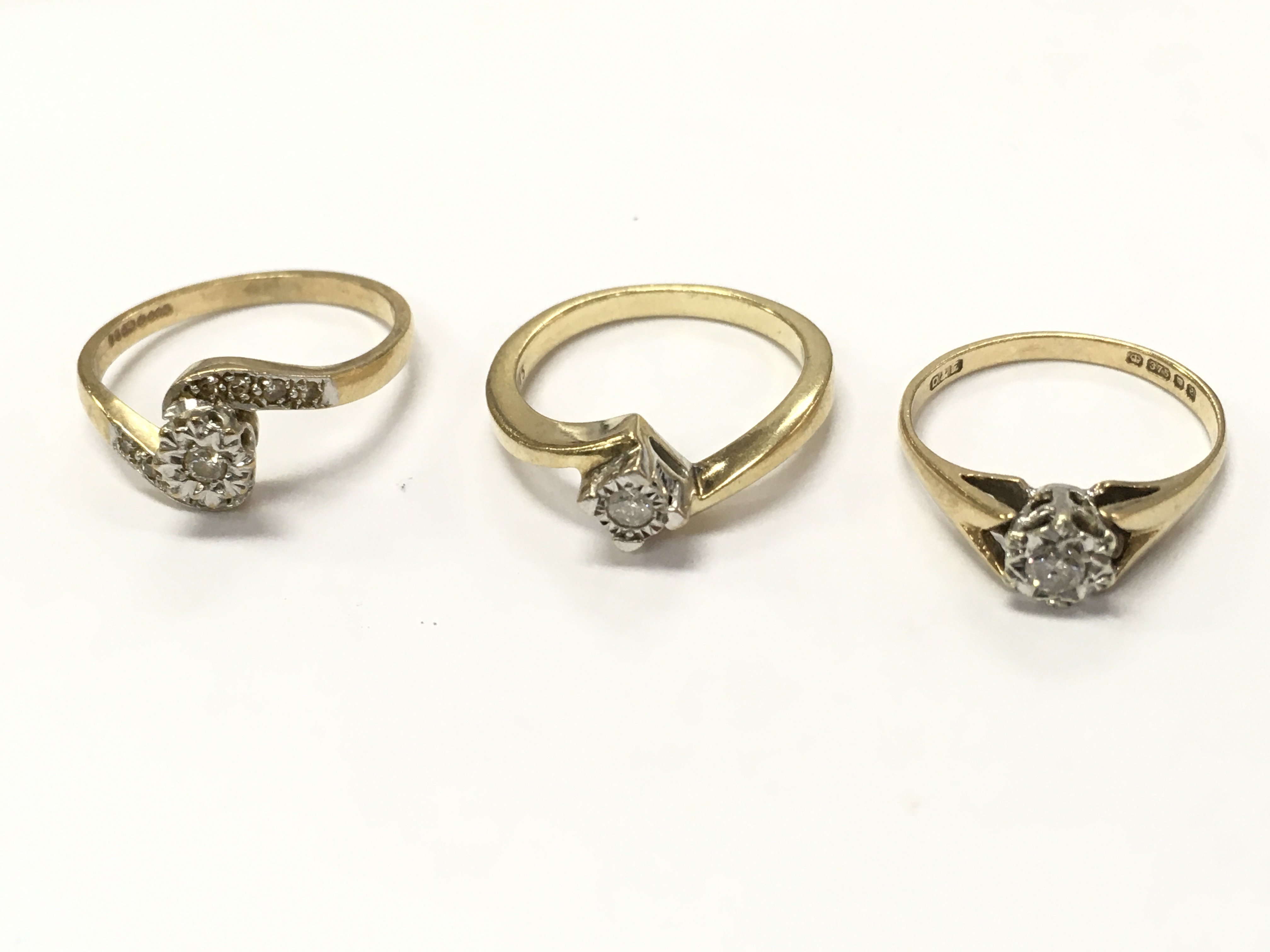 9ct gold diamond solitaire rings, 6.3G total weight. Postage category A