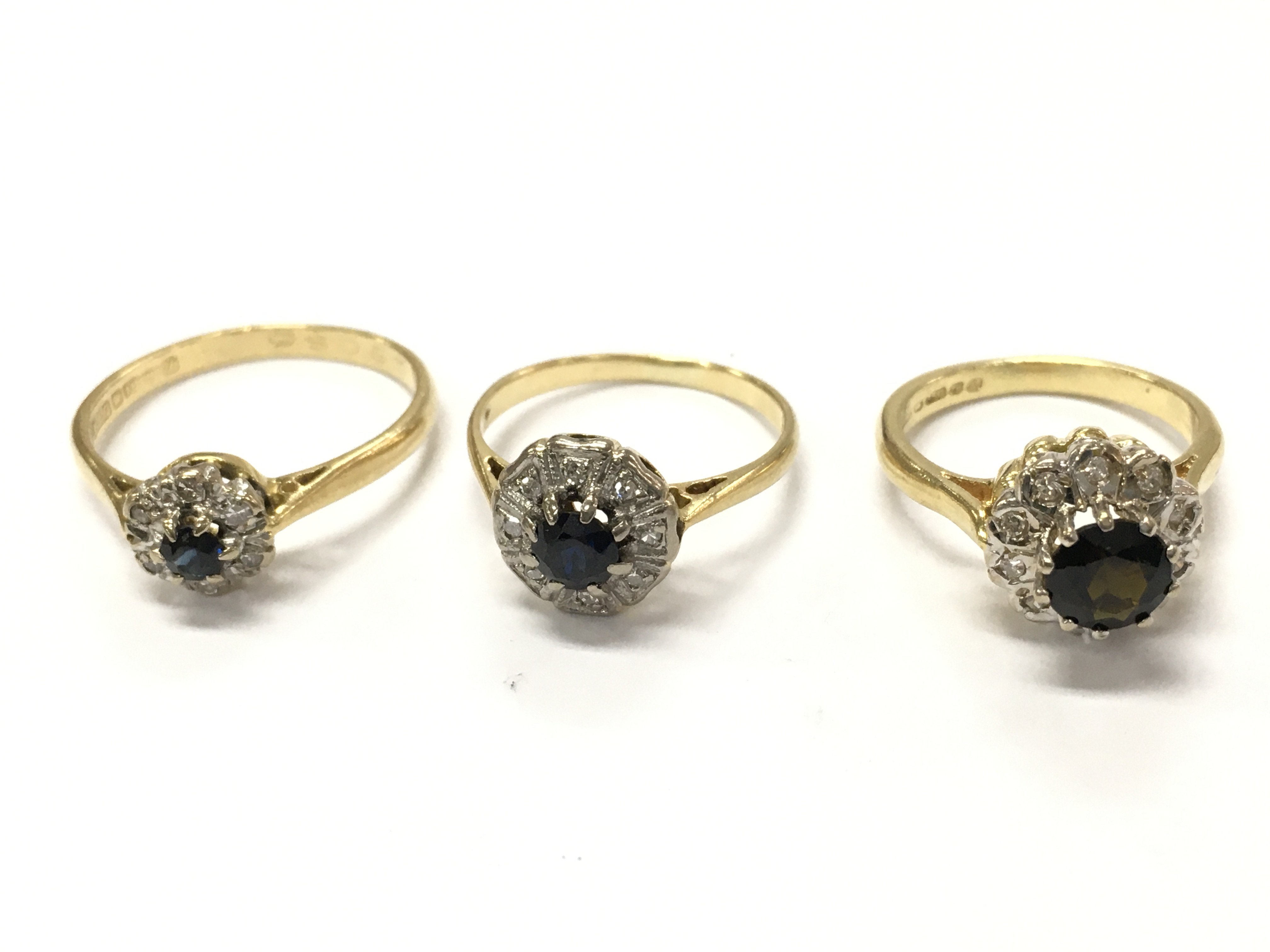 18ct gold sapphire and diamond cluster ring size G, N/O, J. Total weight 8.8g. Postage category A