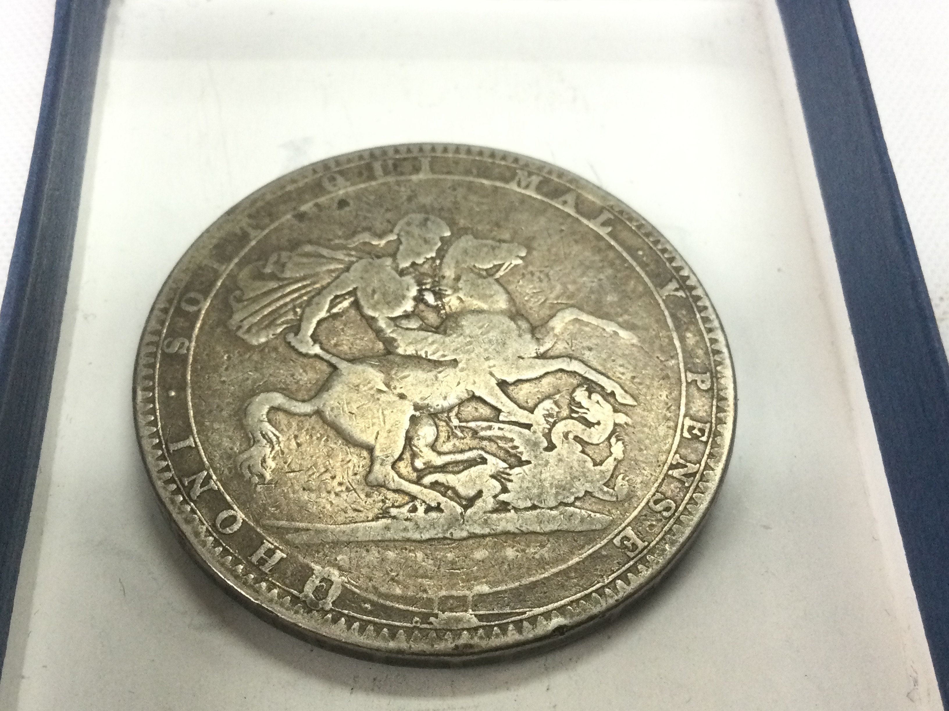 An 1819 Crown coin. Shipping category A.