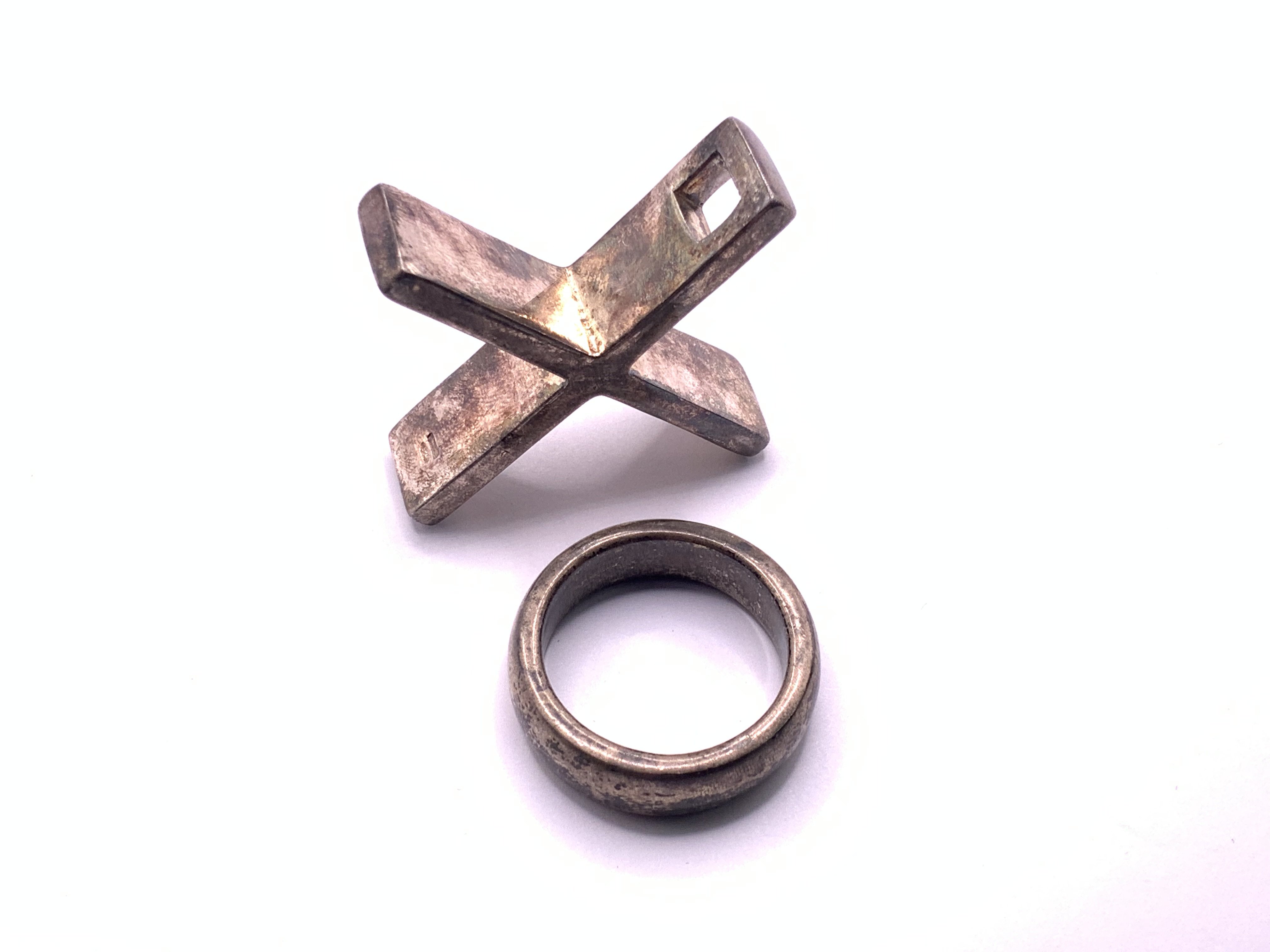 A substantial hallmarked silver cross pendant together with a sterling silver ring. (A)