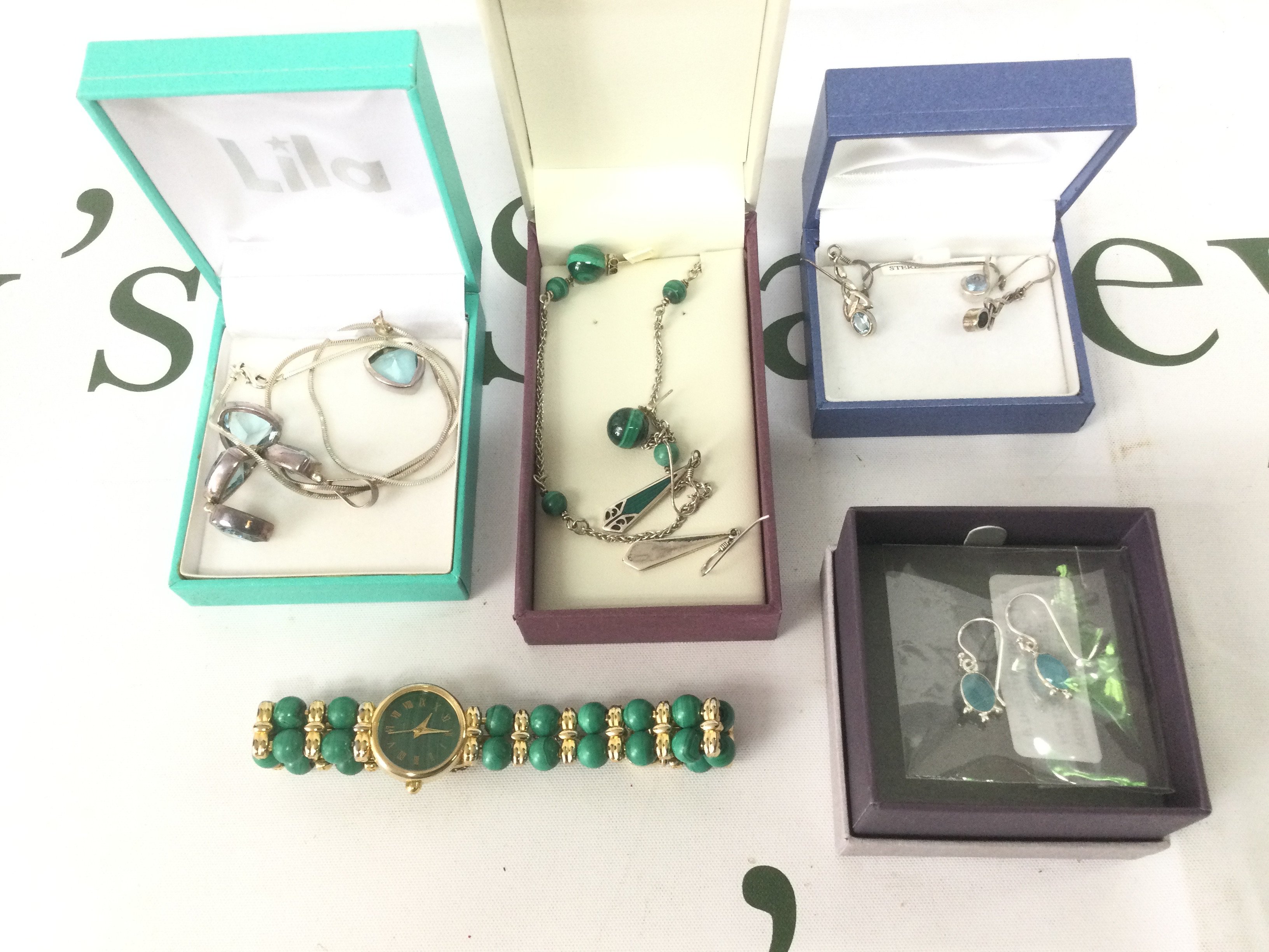 A small collection of silver jewellery comprising earrings, watch etc. Shipping category B.