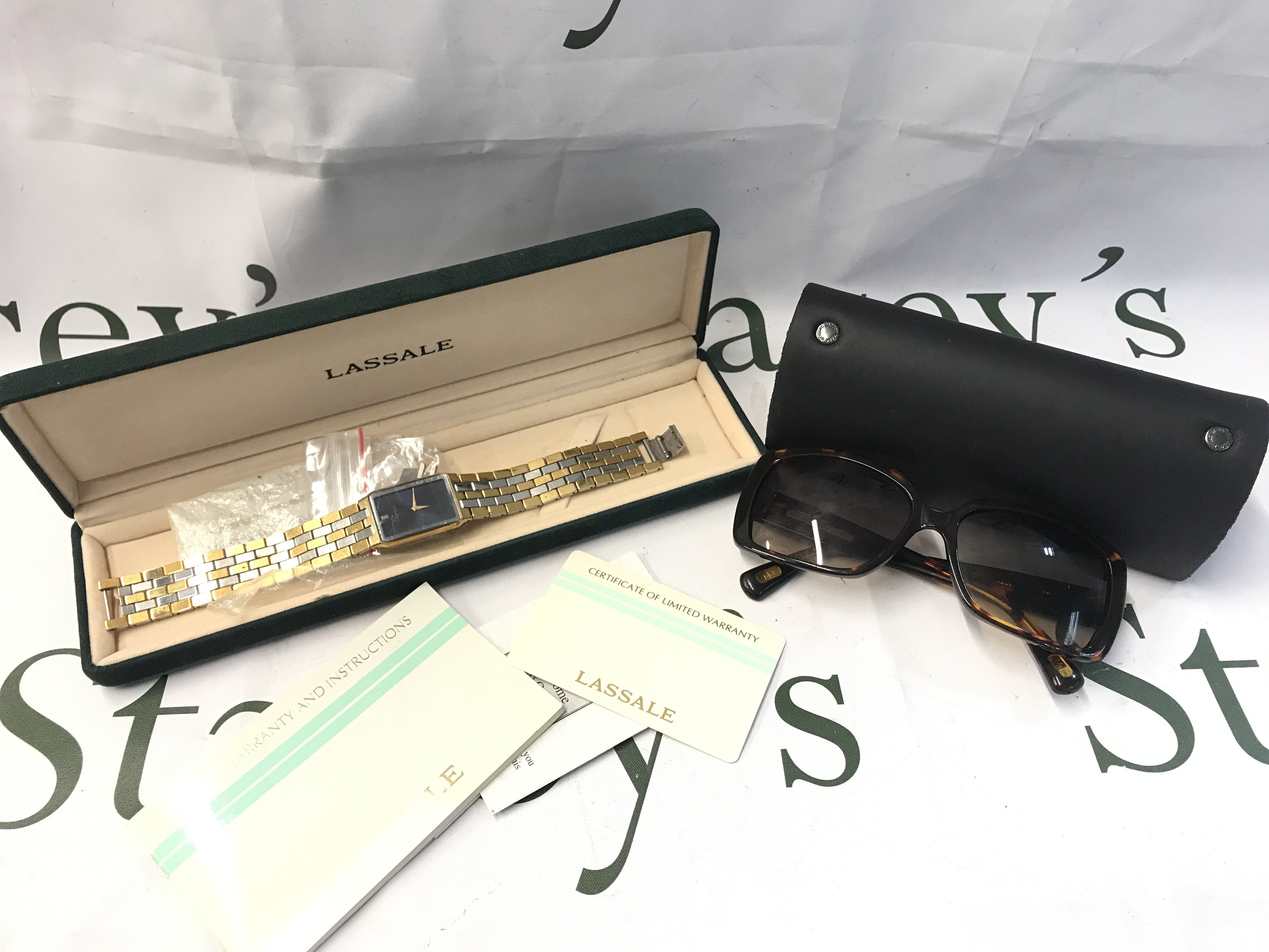 A boxed Lassale watch, Marc Jacobs sunglasses. No reserve Postage catB