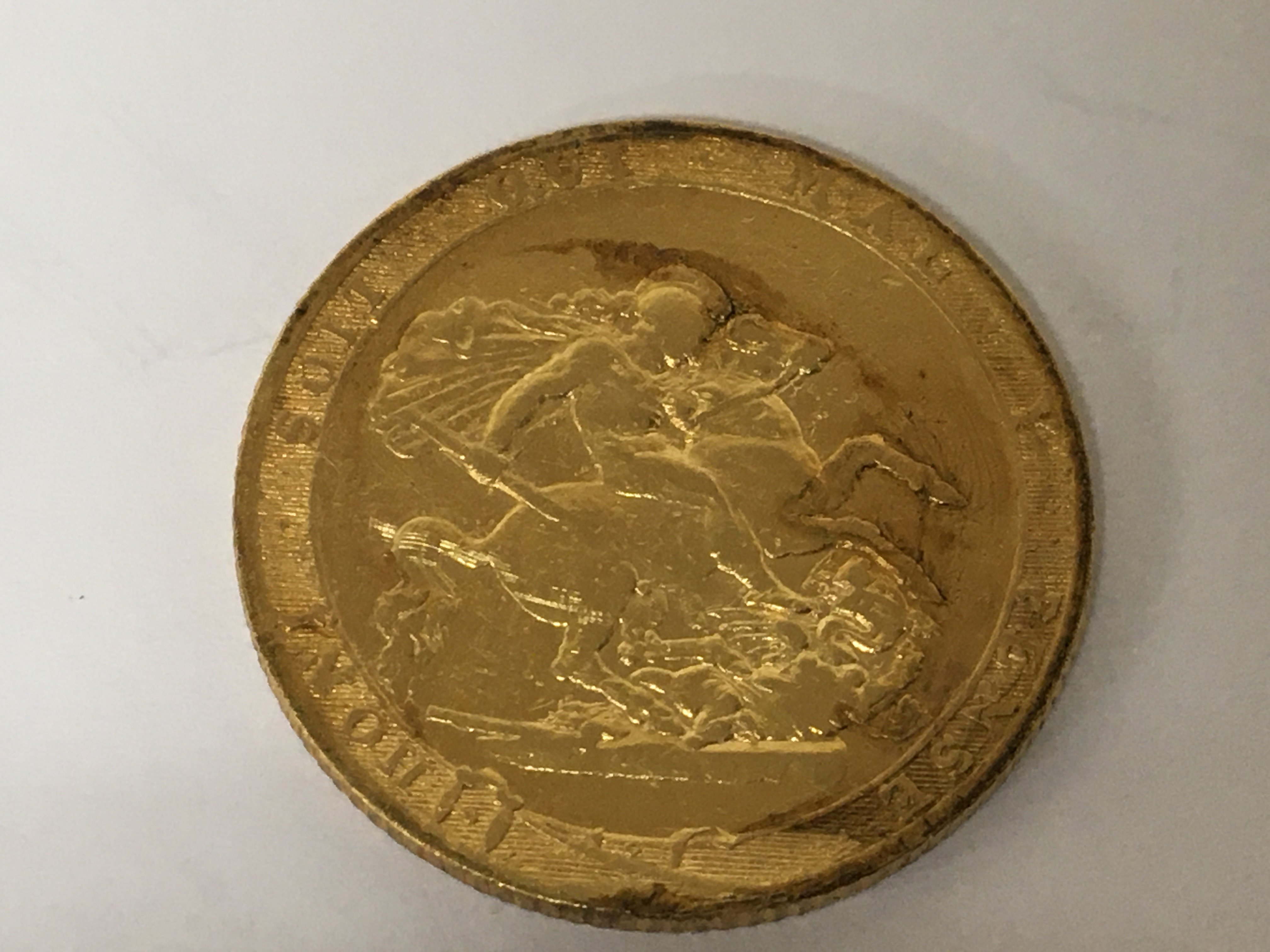 A George III 1817 gold sovereign.