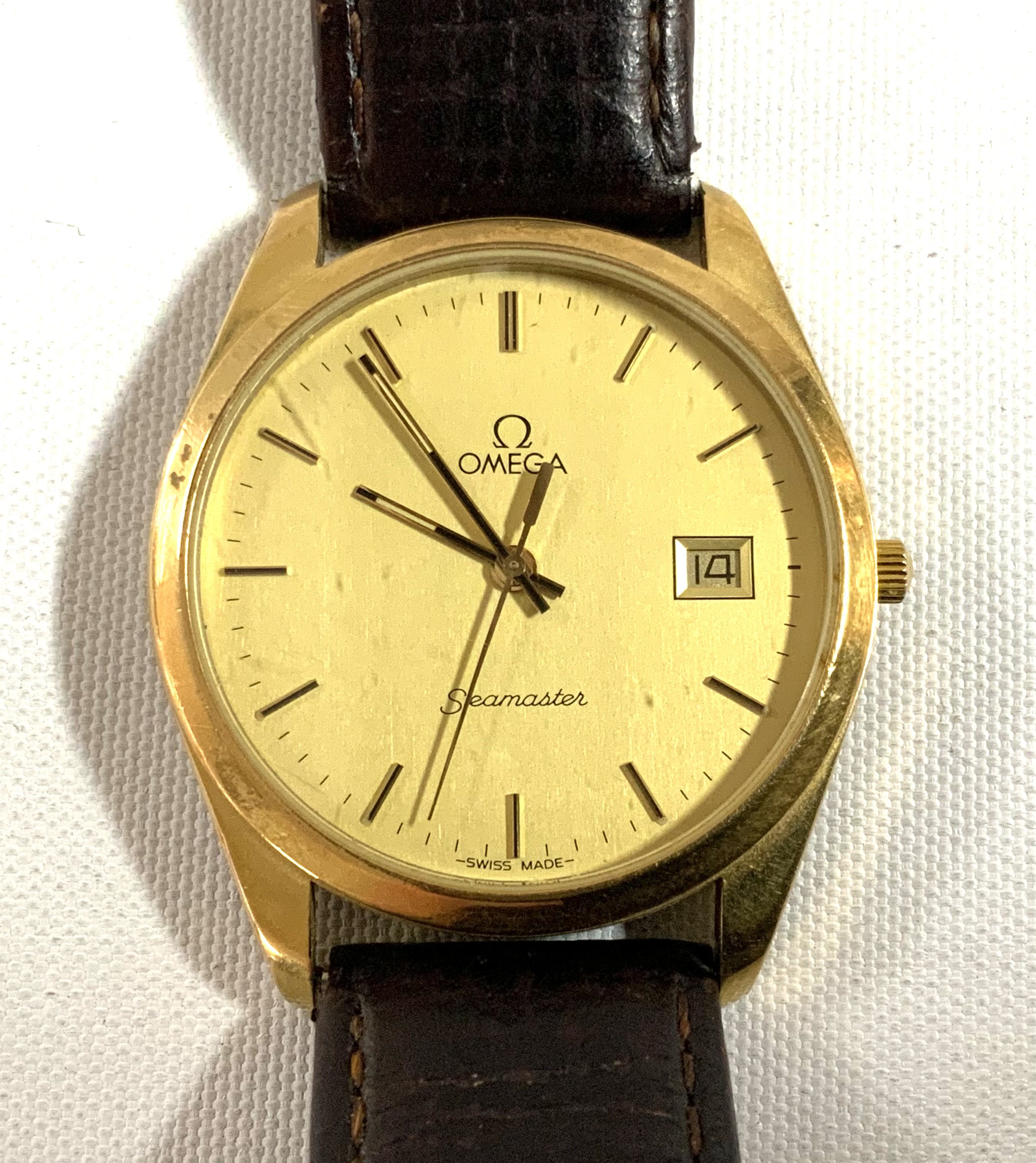 A vintage gold plated Omega Seamaster date, Quartz. (A)