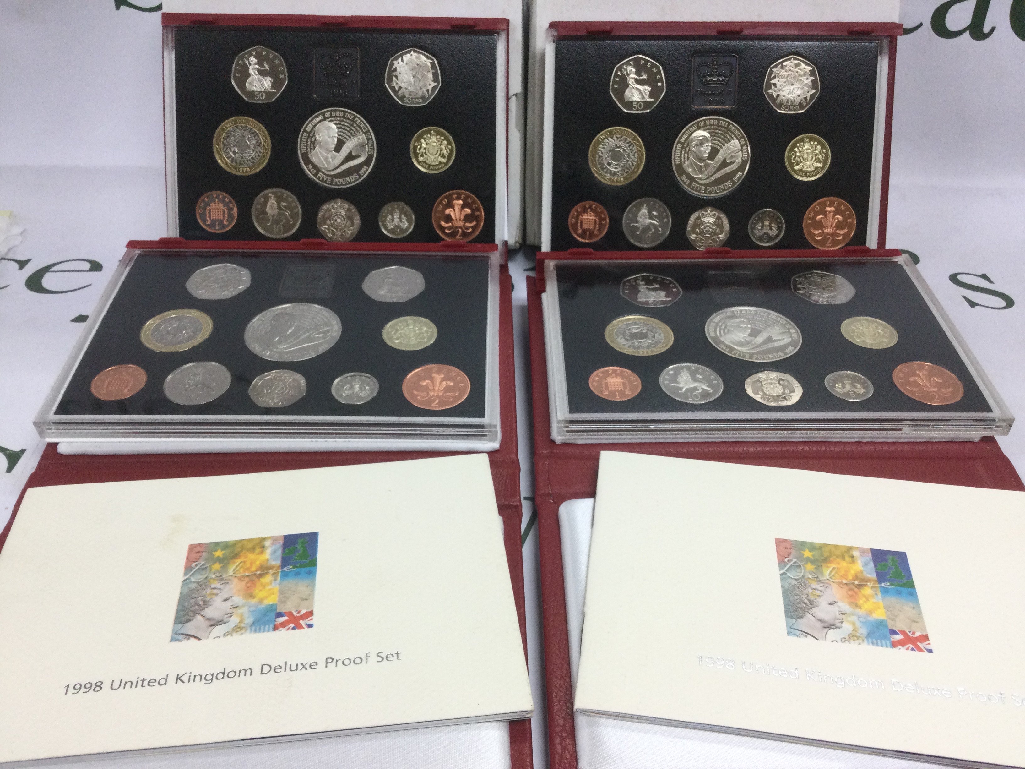 Eight GB coin proof sets. Shipping category B.