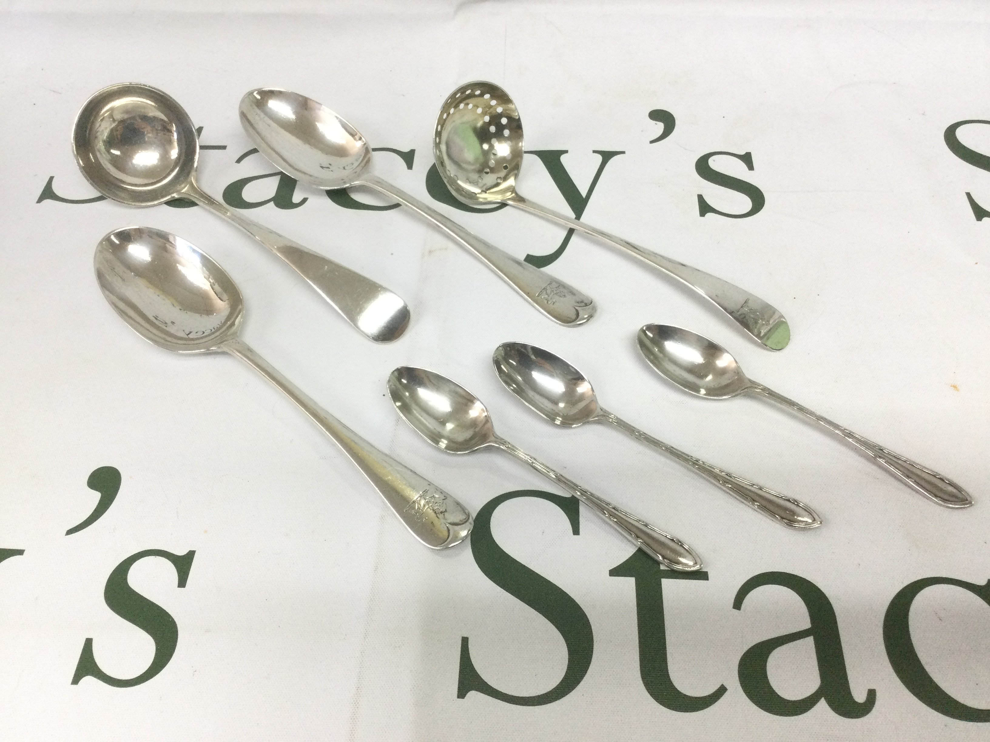 A small collection of silver spoons. Shipping category B.