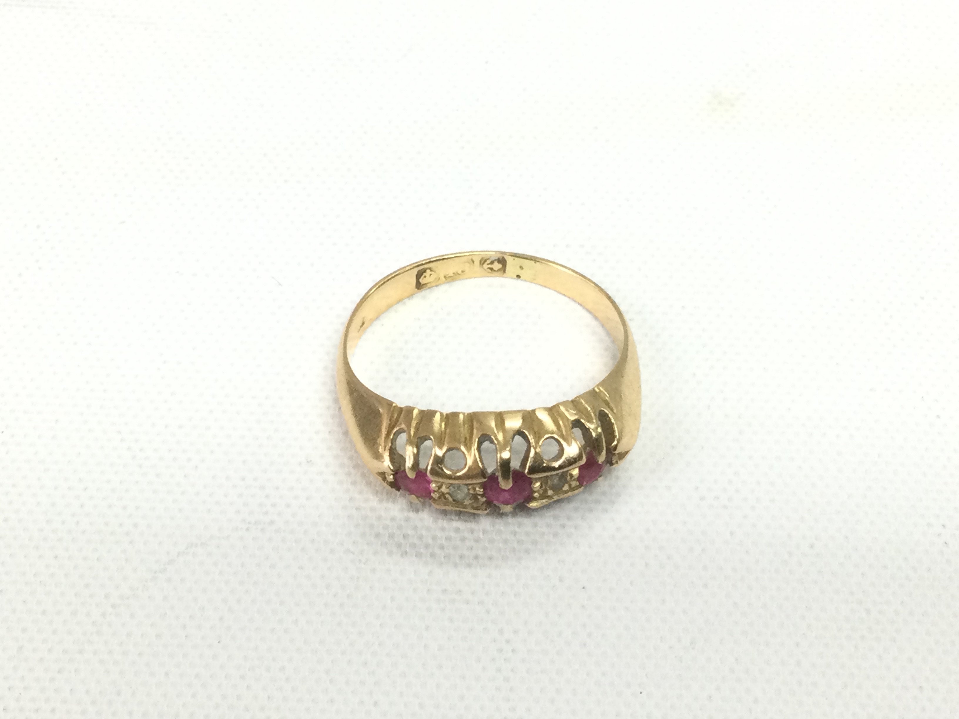 An 18ct gold ring set with diamonds, approx 2.2g and approx size I. Shipping category A.