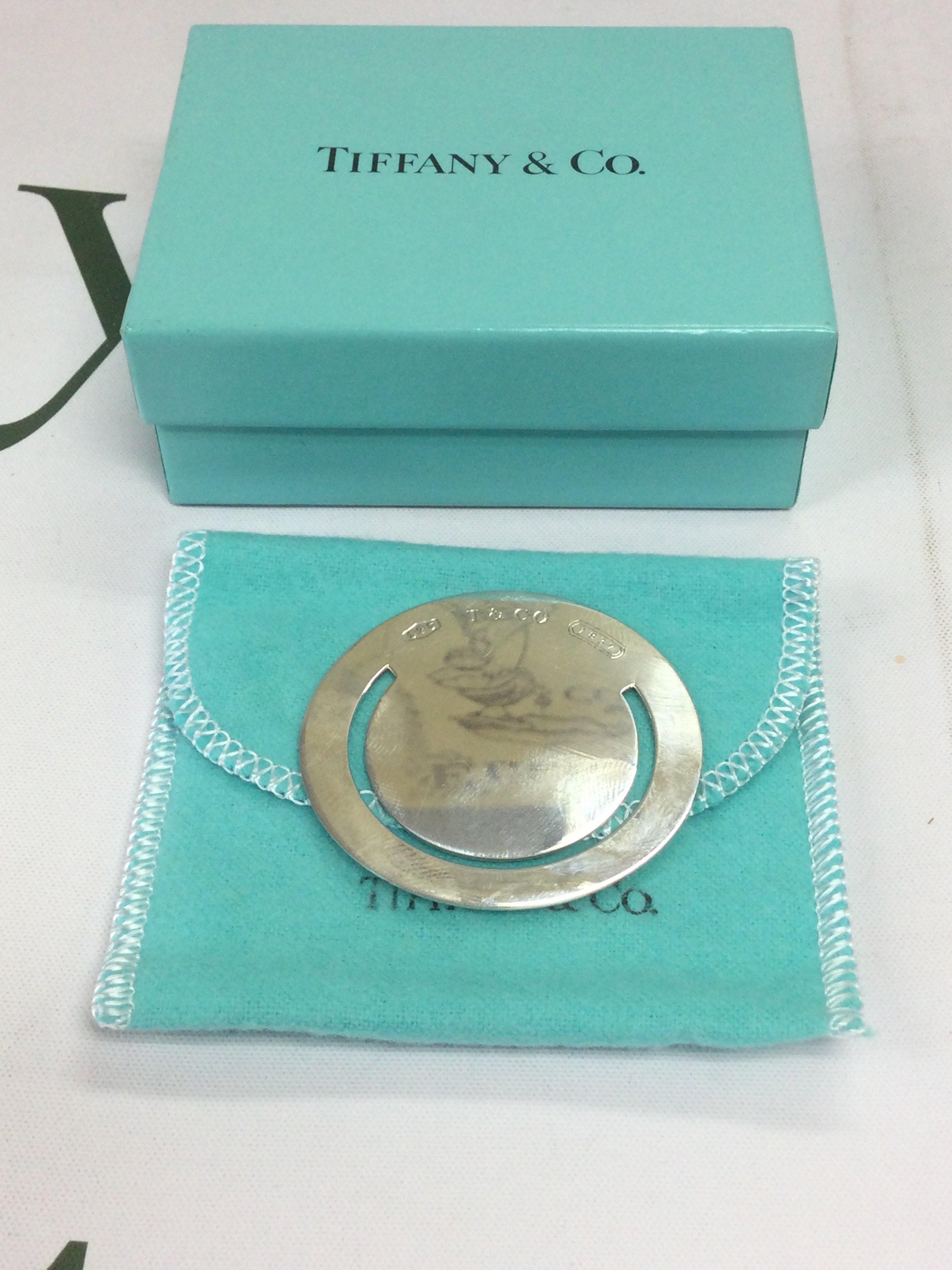 A boxed Tiffany silver money clip. Shipping category A.