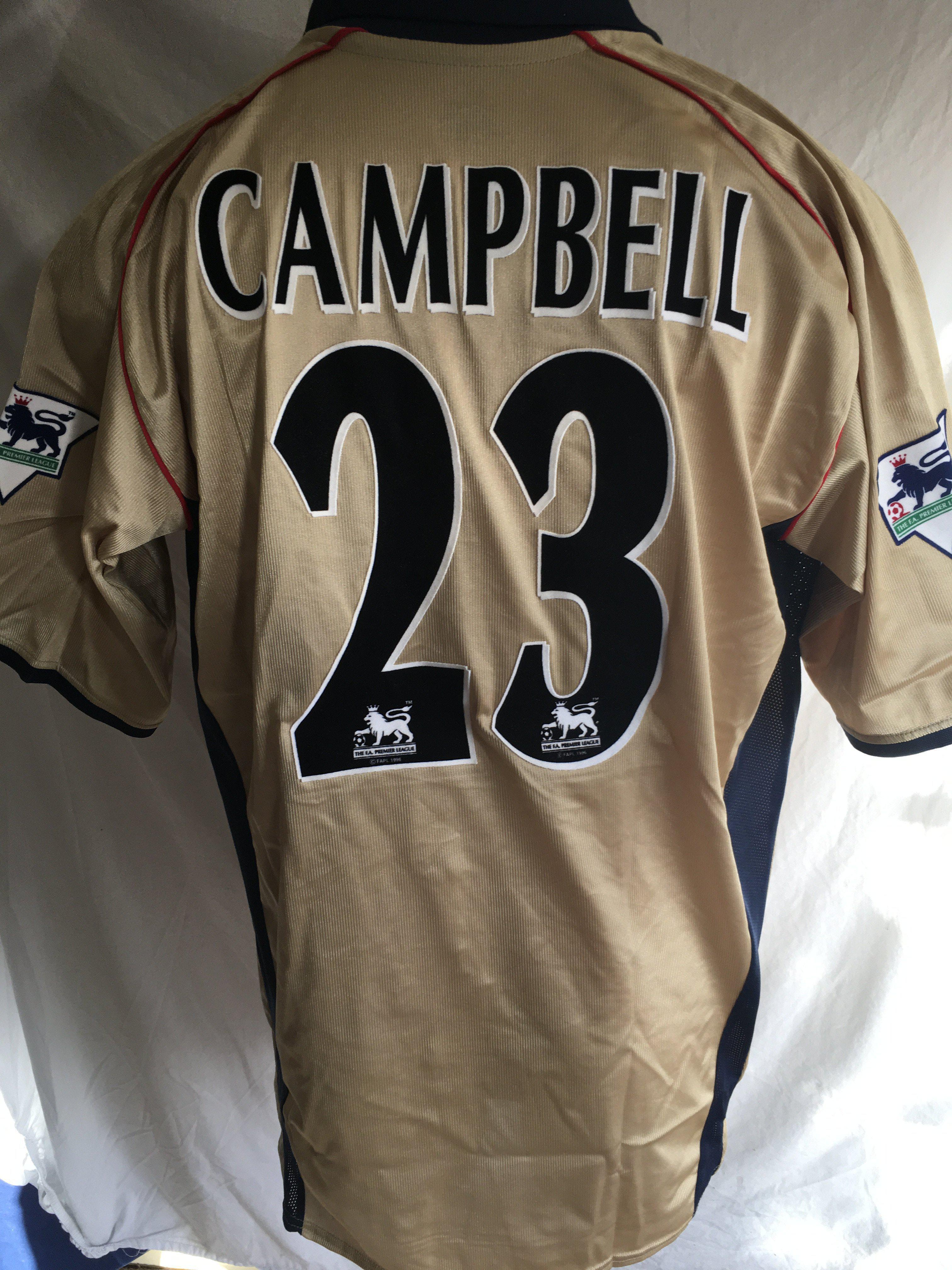 Arsenal 2002 FA Cup Semi Final Match Worn Football Shirt: Gold Nike Sega short sleeve shirt with Premier League patches to arms and 23 Campbell to rear. C/W the shorts worn and a card signed by Soo Campbell stating these were worn by him v Middlesbrough at Old Trafford.