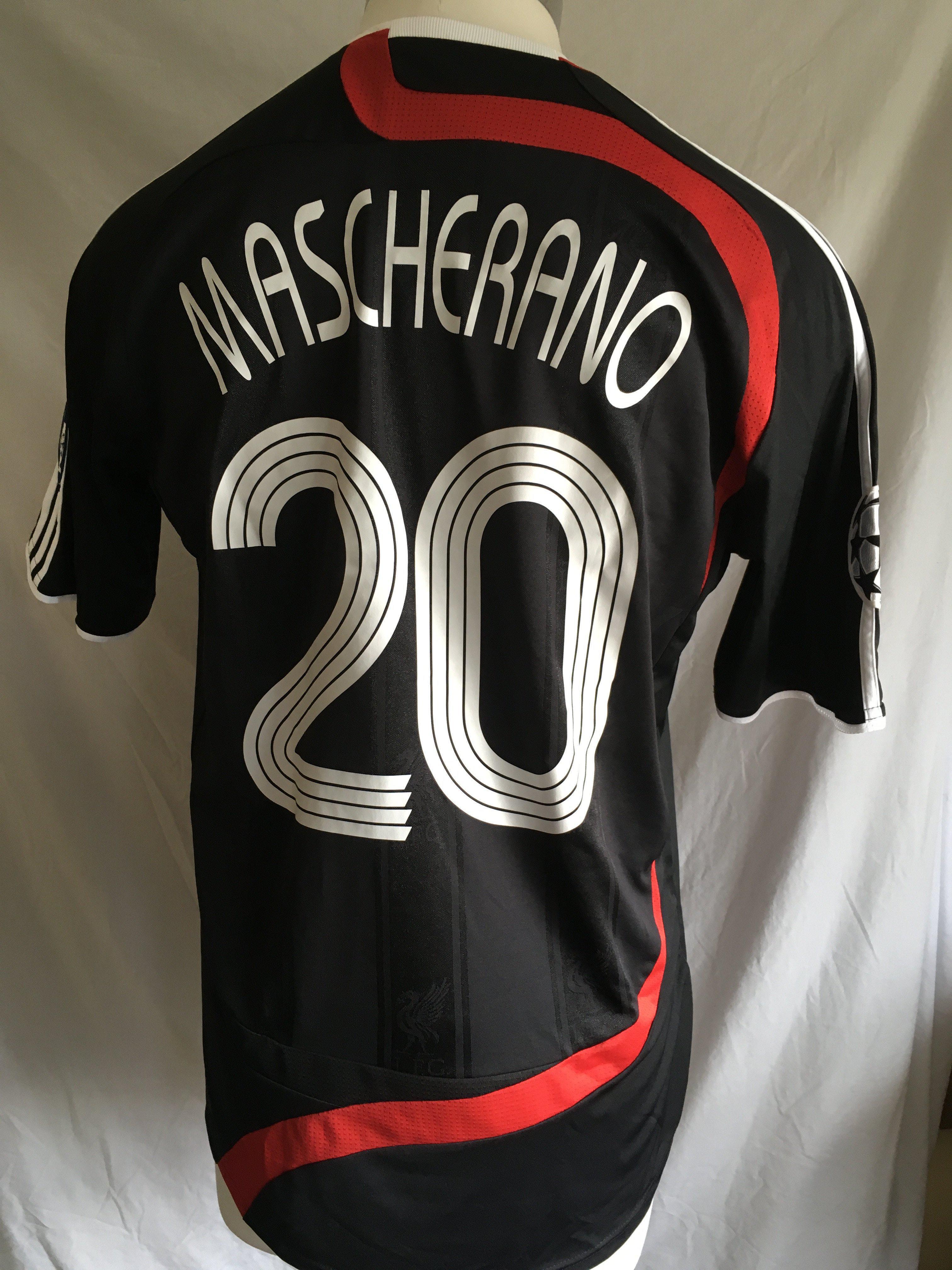 Liverpool 2007 - 2008 Rare Champions League Match Issued Football Shirt: Incredibly rare, this shirt was made for Champions League matches and this was believed to be issued v Arsenal. Short sleeve black with red flash and white stripes to arms. Carling sponsor was used on shirt. Worn by Mascherano whose name and number 20 appear to rear.