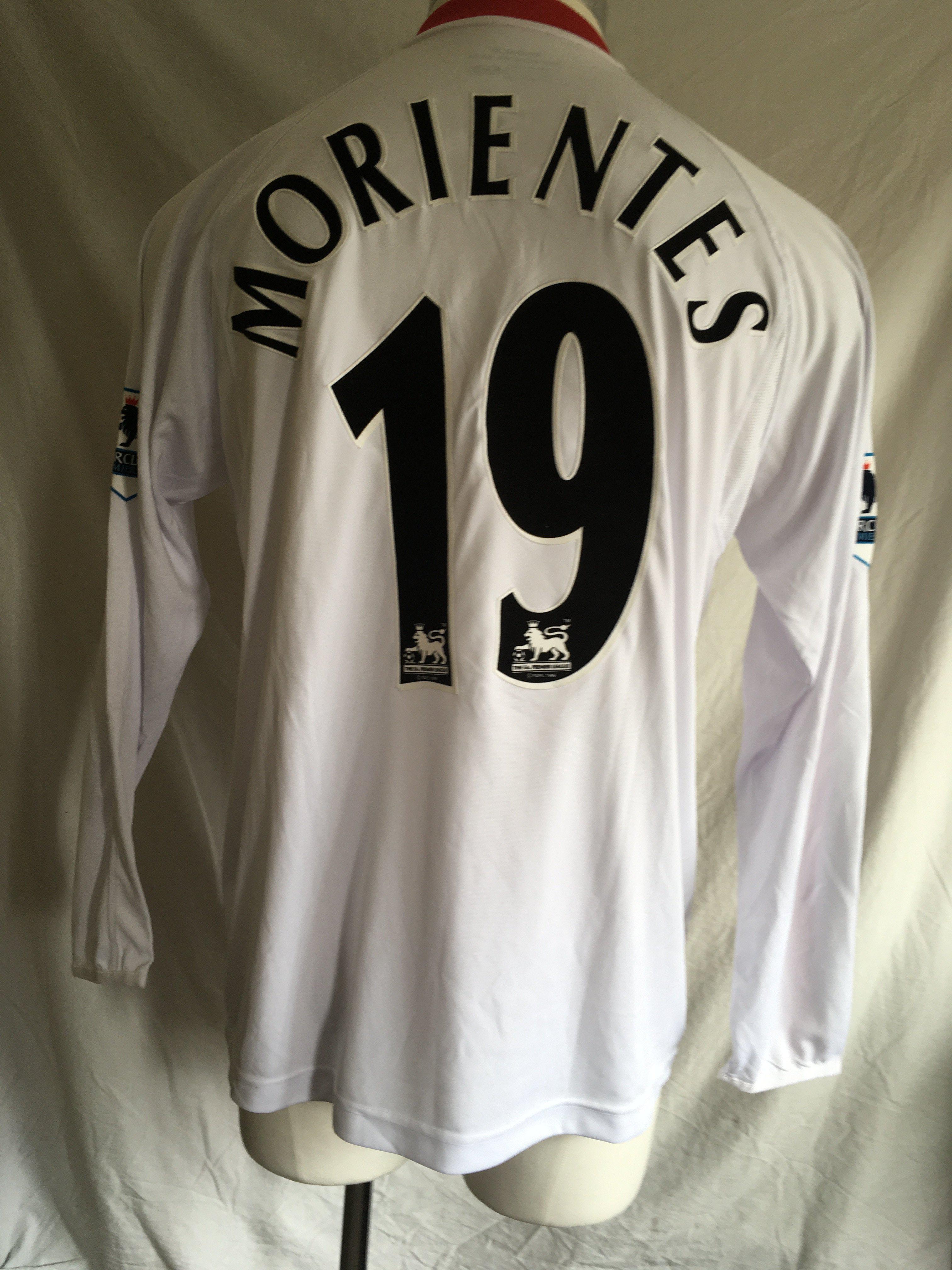 Morientes 2005/2006 Liverpool Match Worn Football Shirt: White long sleeve shirt, number 19 with Morientes to rear and Premier League badging to arms. Signed by Rafa Benitez who obtained the shirt for vendor.