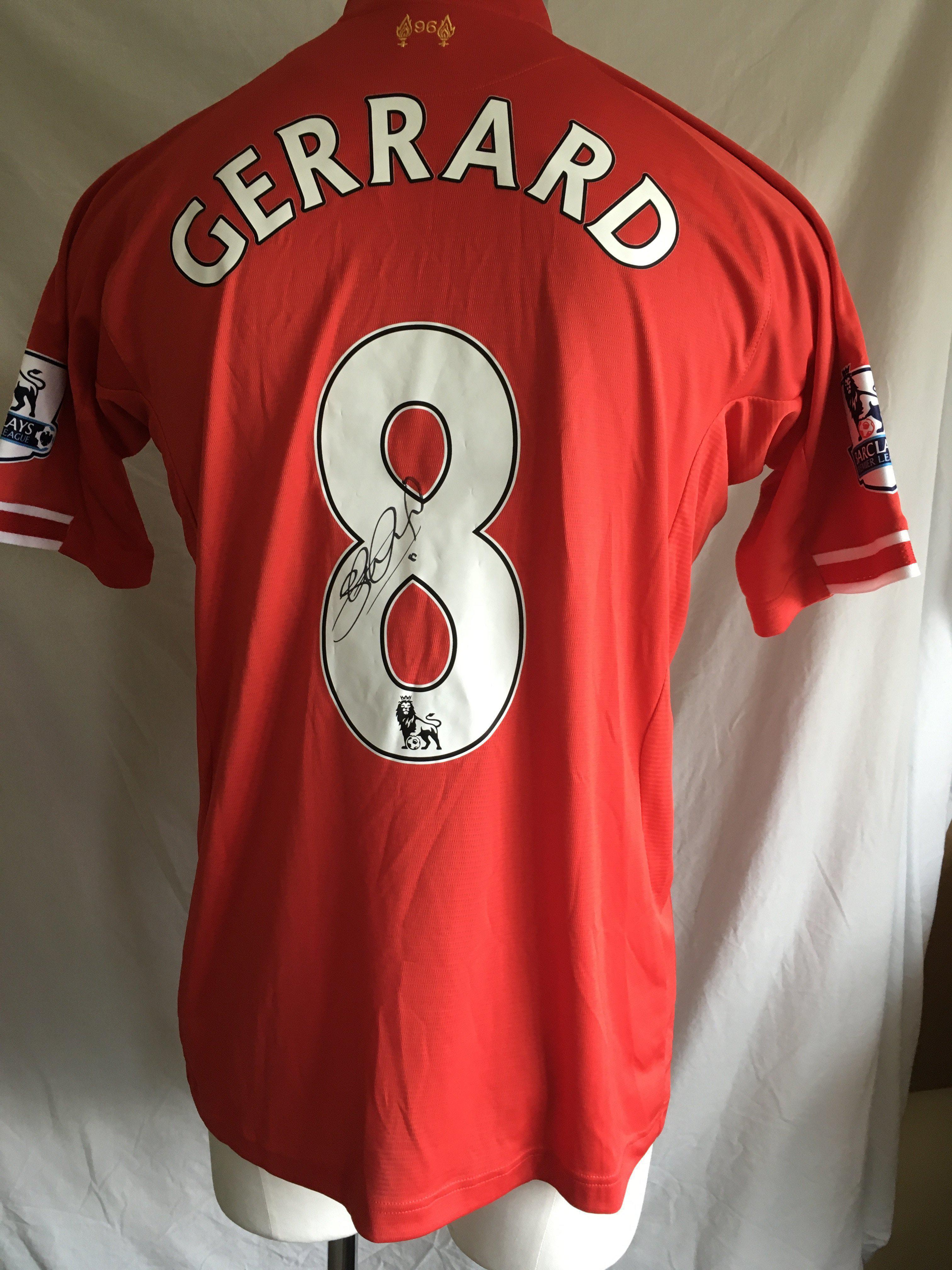 Gerrard 2013 - 2014 Liverpool Match Worn Football Shirt: Red number 8 with Gerrard to rear. Premier League badging to arms. Signed to rear by Gerrard.