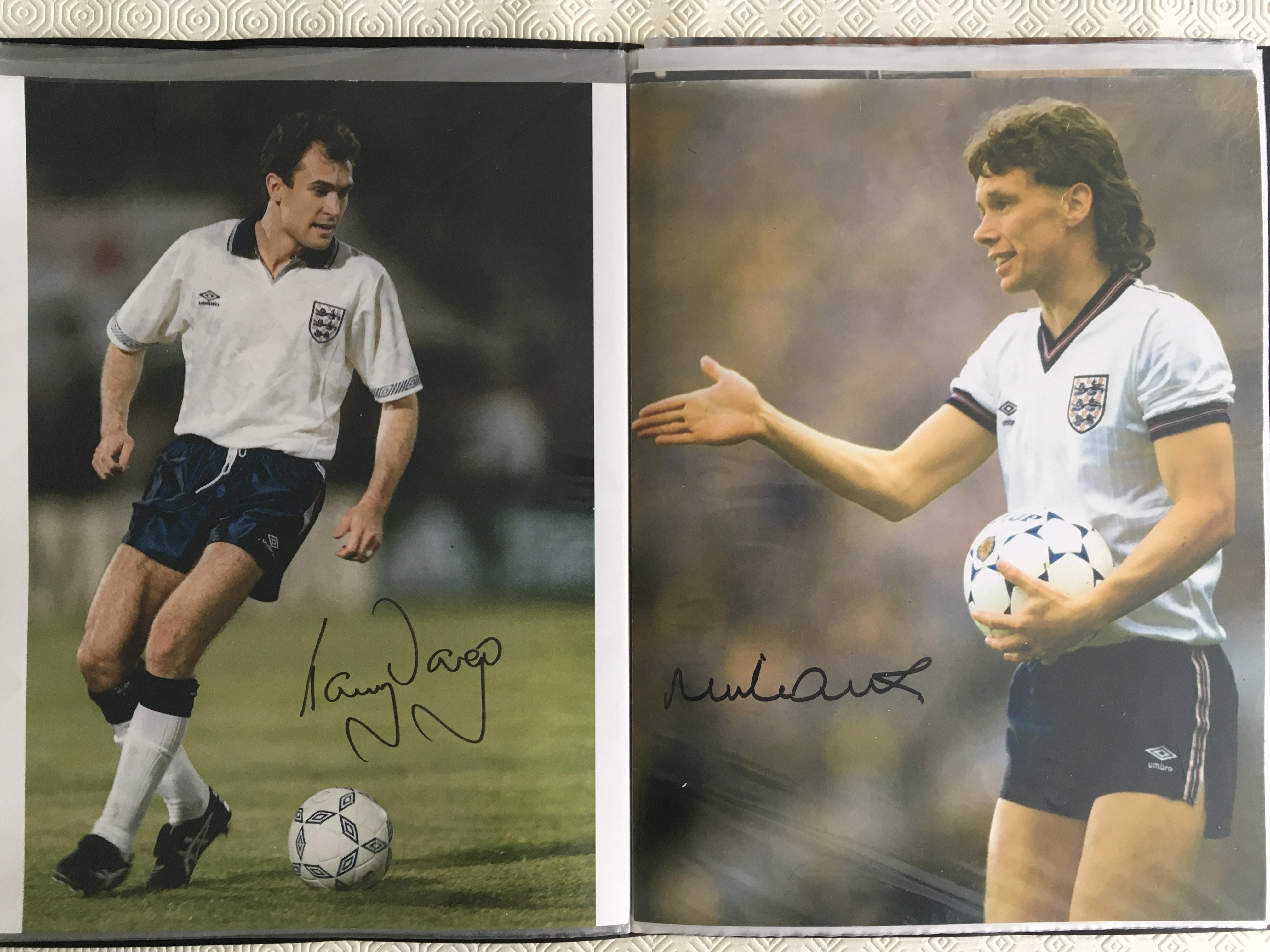 England Large Signed Photo Album: All 16 x 12 inch photos signed by Seaman, Sheringham, Owen, Marsh, Dorigo, Barnes, Adams, Reid, Madeley, Shilton x 2 plus a few more and some further unsigned. There are 3 unstamped 60s press photos and 7 signed in Manchester United kit. (32)