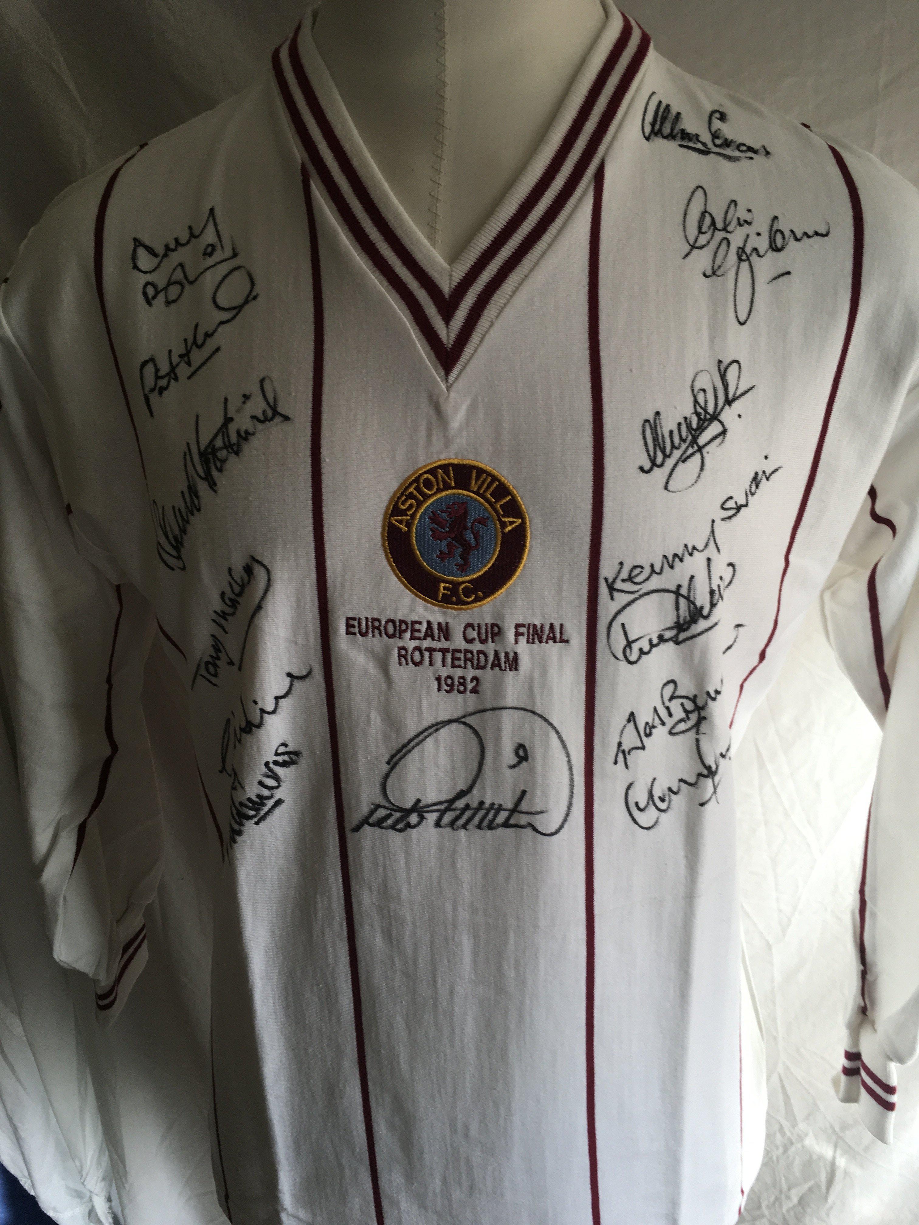 Aston Villa Fully Signed 1982 European Cup Final Shirt: Replica long sleeve shirt with identical European Cup Final Rotterdam 1982 stitching to front of white shirt. Hand signed in black marker pen by 14 of the squad including Swain, Evans, Withe, Morley, Mortimer and Bremner.