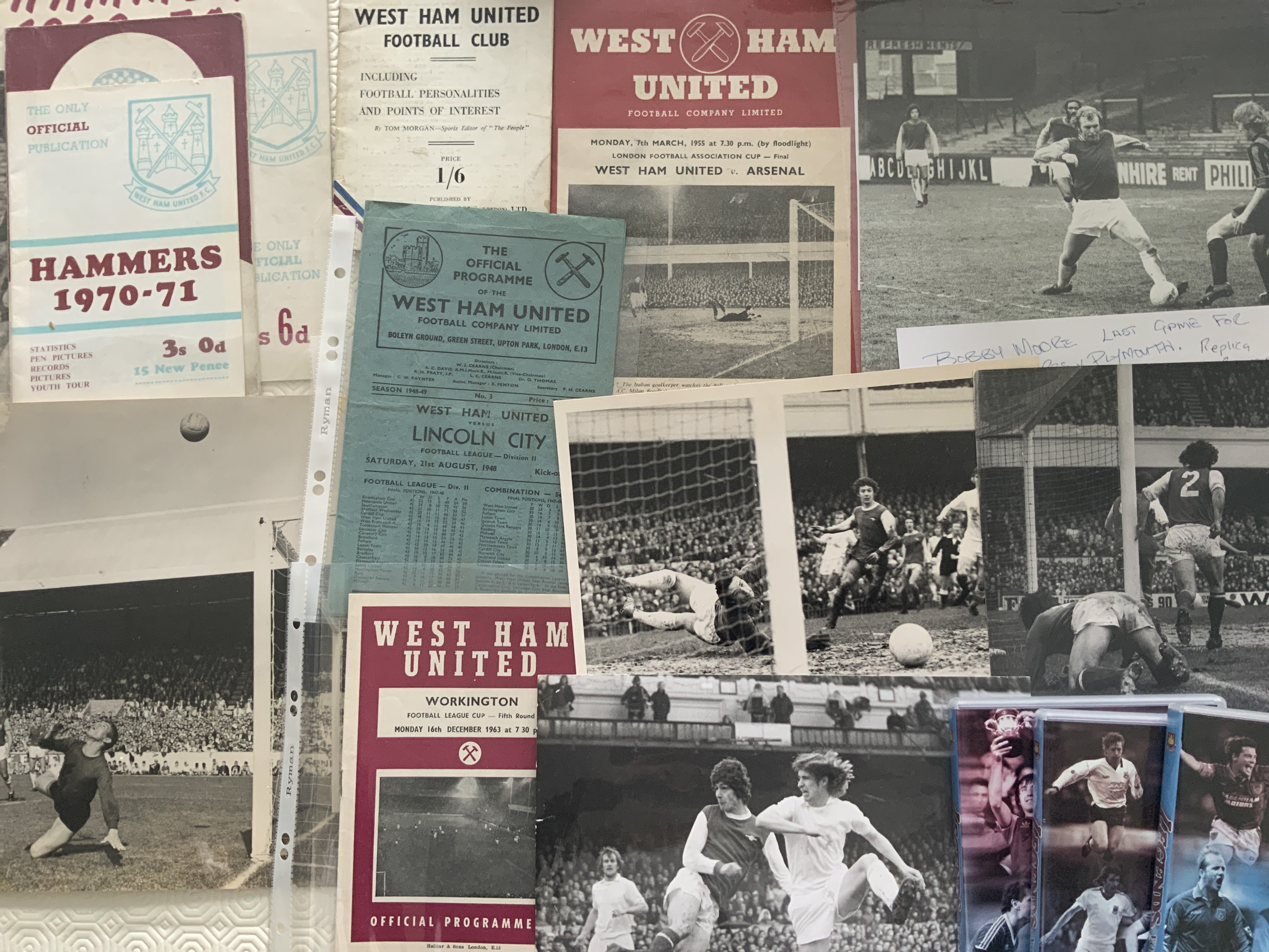 West Ham Football Memorabilia Box: Books including 1949s Lets Talk About West Ham DVDs, Ron Greenwood memorabilia pack, handbooks, signed photos, press photos including 3 of Taylor v Arsenal 1975 FA Cup, 1962 Laurie Leslie action press photo, programmes including homes v 63/64 Workington league cup, 48/49 Lincoln and 54/55 Arsenal London FA cup, replica photos including Moores last match v Plymouth and more. Worth a look.