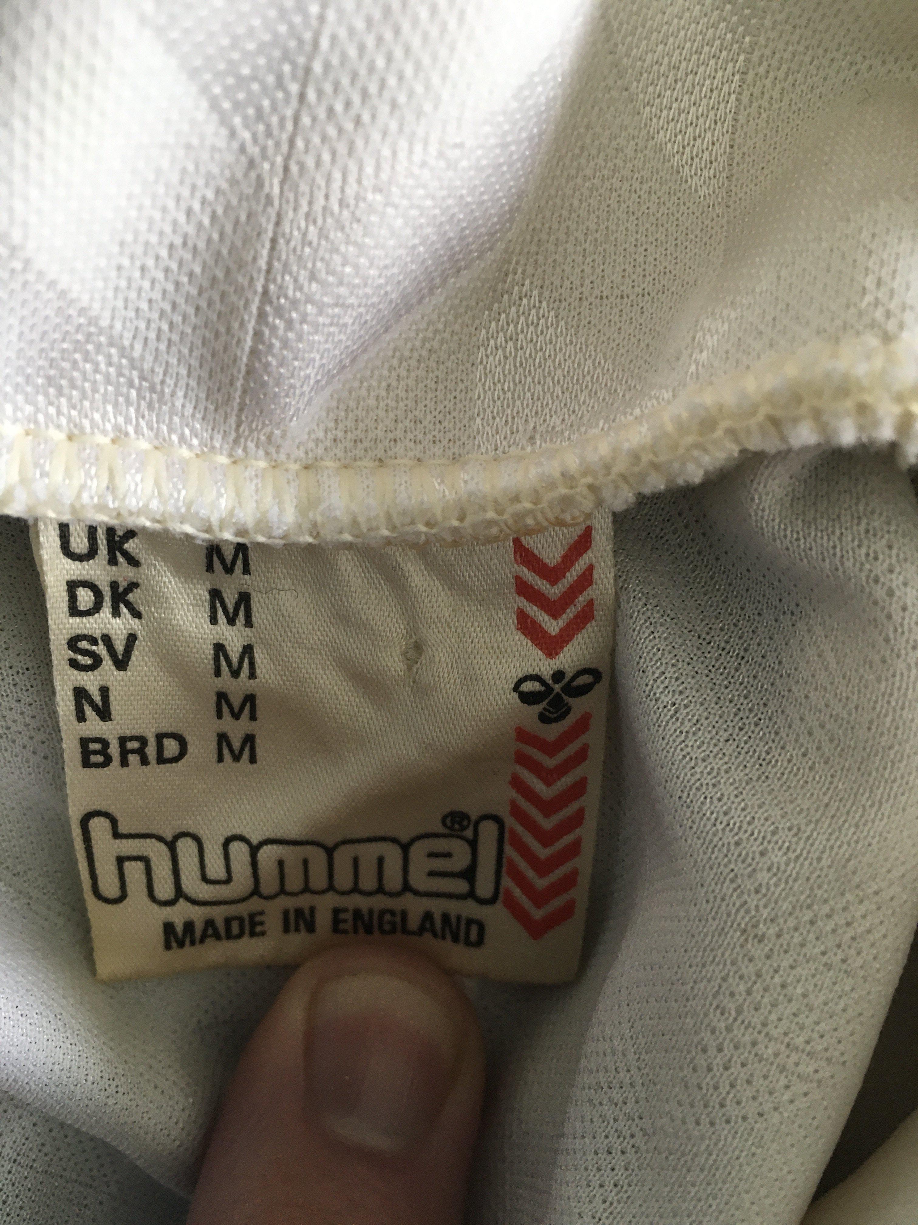 Tottenham 1987 FA Cup Final Match Issued Football Shirt: White short sleeve Hummel shirt with Holsten sponsor. FA Cup Final 1987 embroidered to breast and number 15 to rear. Signed by 13 Spurs players lightly but clearly. Verbally told the shirt was given to Tony Galvin but not proven. If it was issued to Galvin it would be the last shirt issued as he transferred in the summer. This was the first FA Cup final that was allowed two subs per team and 12 and 14 were used for that. It was customary at the time to produce up to 18 shirts by clubs.