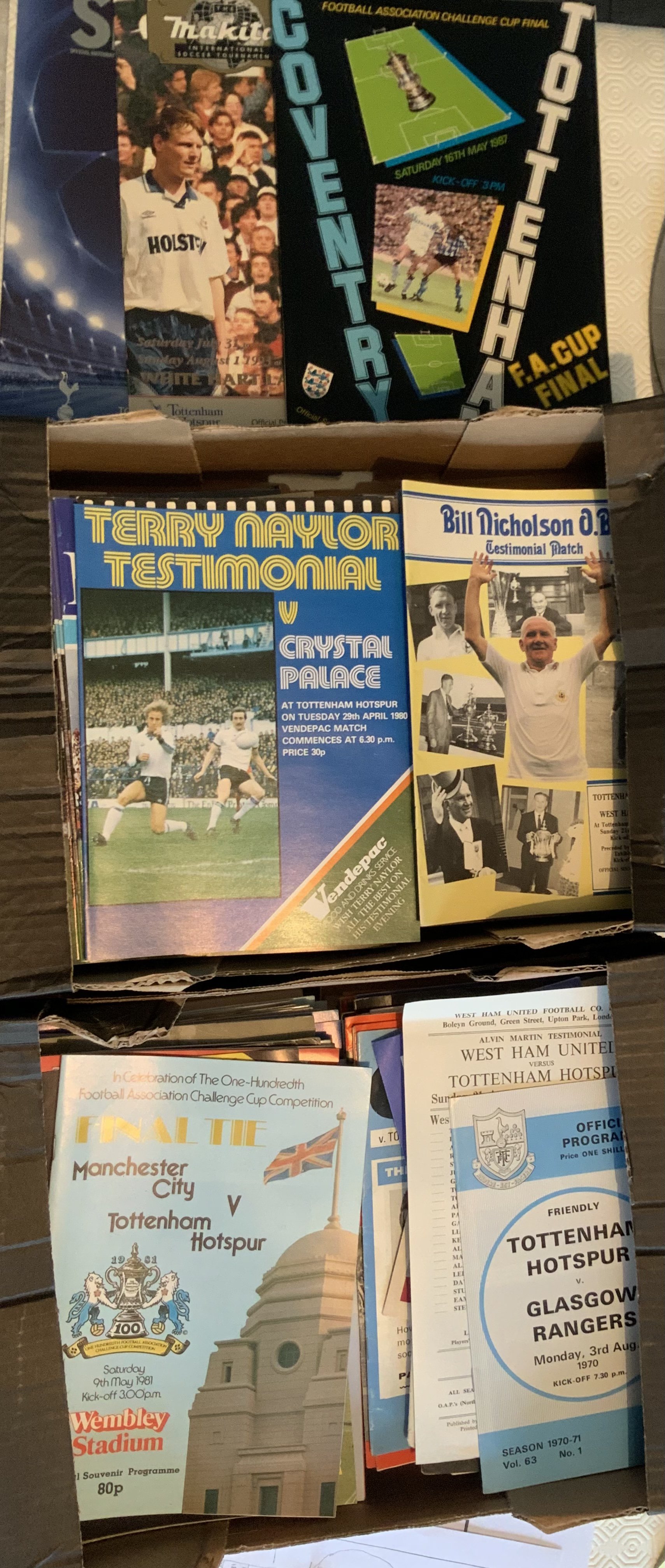 Tottenham Football Programmes: Some big match with cup finals testimonials friendlies and Europeans. The majority are 70s to the 90s including some full sets. 2 small boxes with instructions to sell.