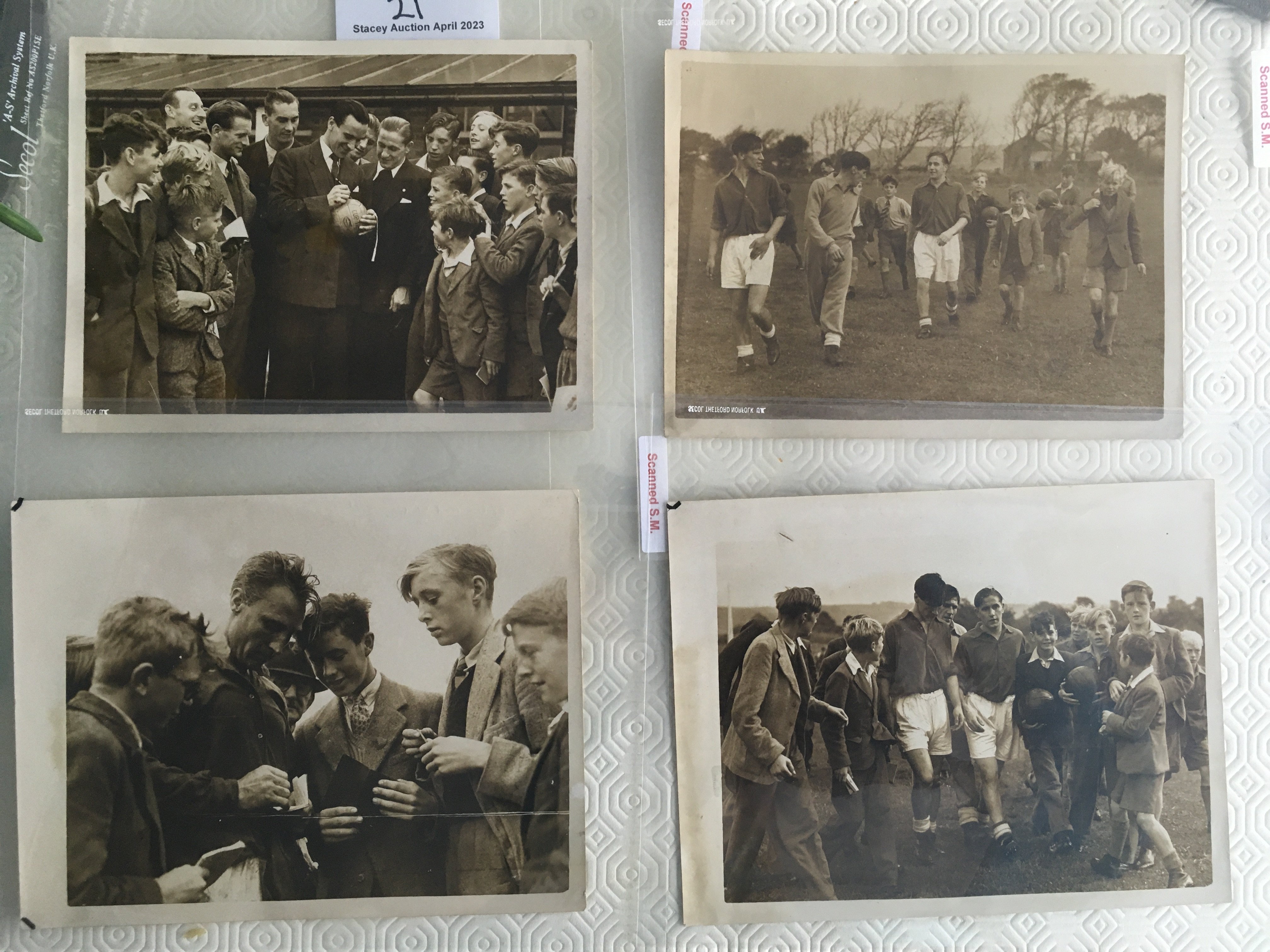 1949 England Football Press Photos: Four original press photos without stamps of the players with fans before the match v Wales. Hand written annotations. (4)