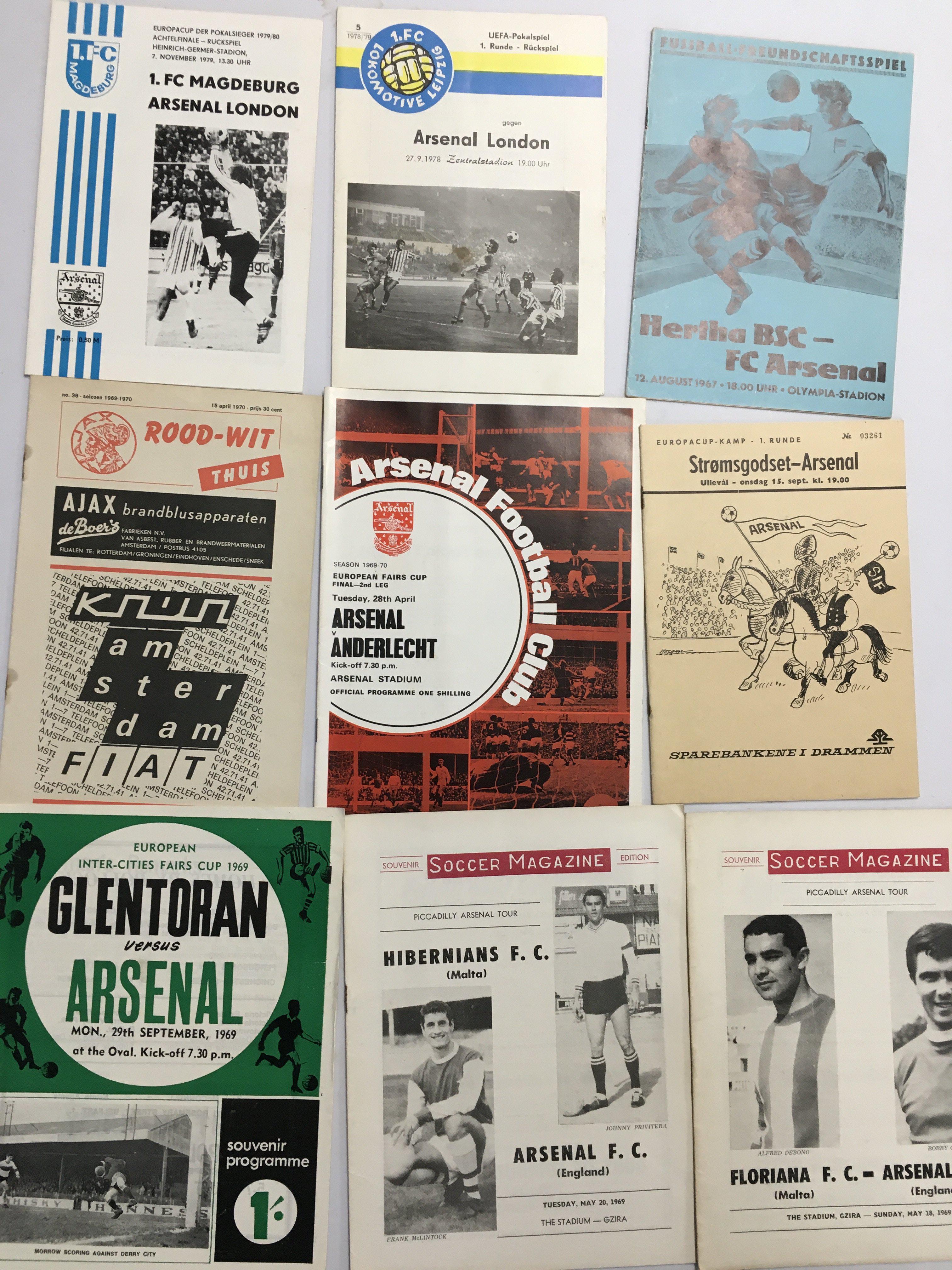 Arsenal Football Programmes + Handbooks: Includes 69/70 Ajax, 71/72 Stromsgodset and some other good European aways, Complete handbook run from 65/66 - 77/78. Stacks of 70s homes programmes plus some 50s. Gunflash magazines and some general pocket Football annuals. (Box)
