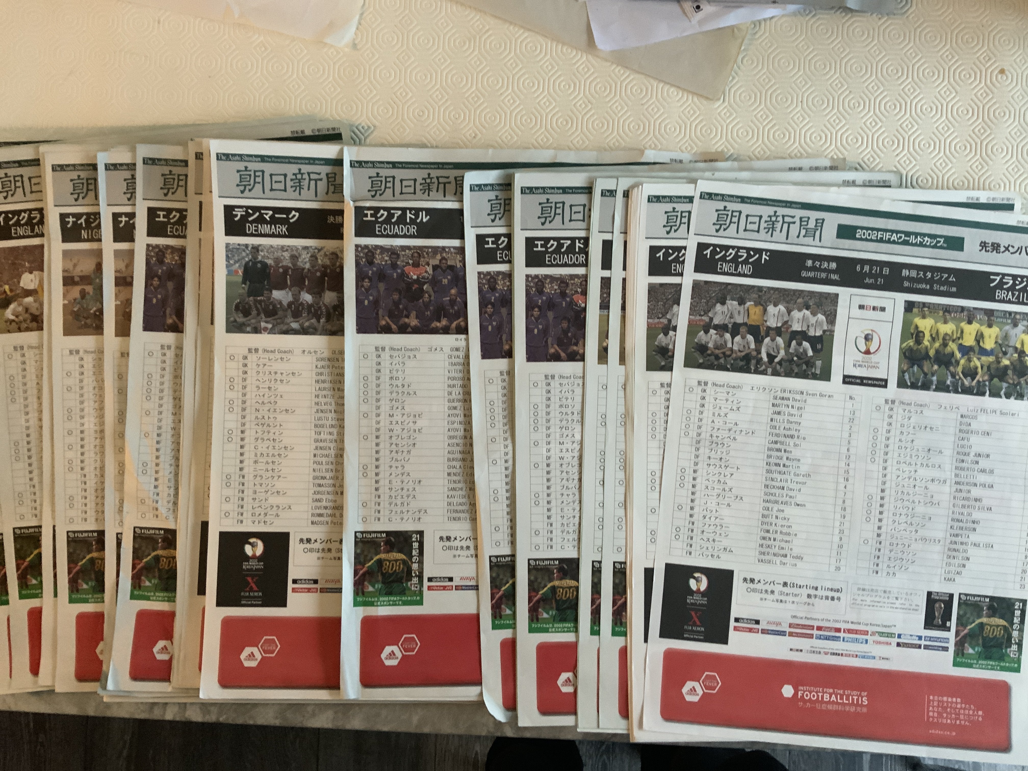 2002 World Cup Large Poster Programmes: Unwritten and not folded large sheets with duplication brought back by vendor from Korea and Japan. Mainly quantities of England matches. (98)