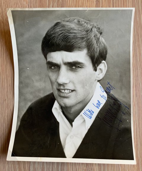 George Best Signed Manchester United Football Press Photo: 10 x 8 inch press photo from around 1965 signed in biro and dedicated to Janet. Press stamp to rear.
