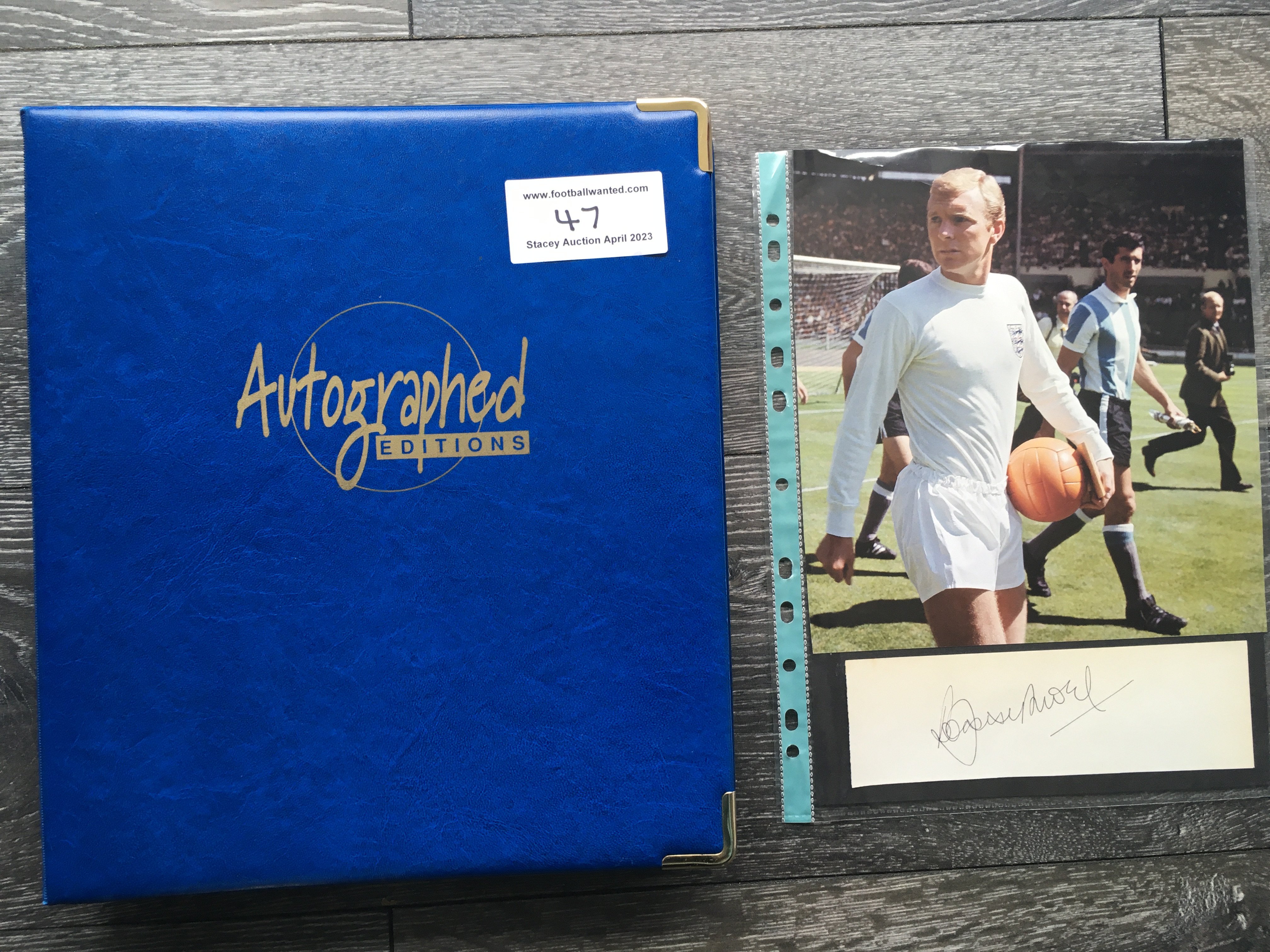 1966 England World Cup Winners Signed Football Prints: All ten of the official Autographed Editions prints of the 1966 England team. C/W a large signed white card of Bobby Moore and picture of him in England kit. No Autographed Edition was ever made of Moore as he died in 1993 before they were produced. Stunning items in official folder. (11)