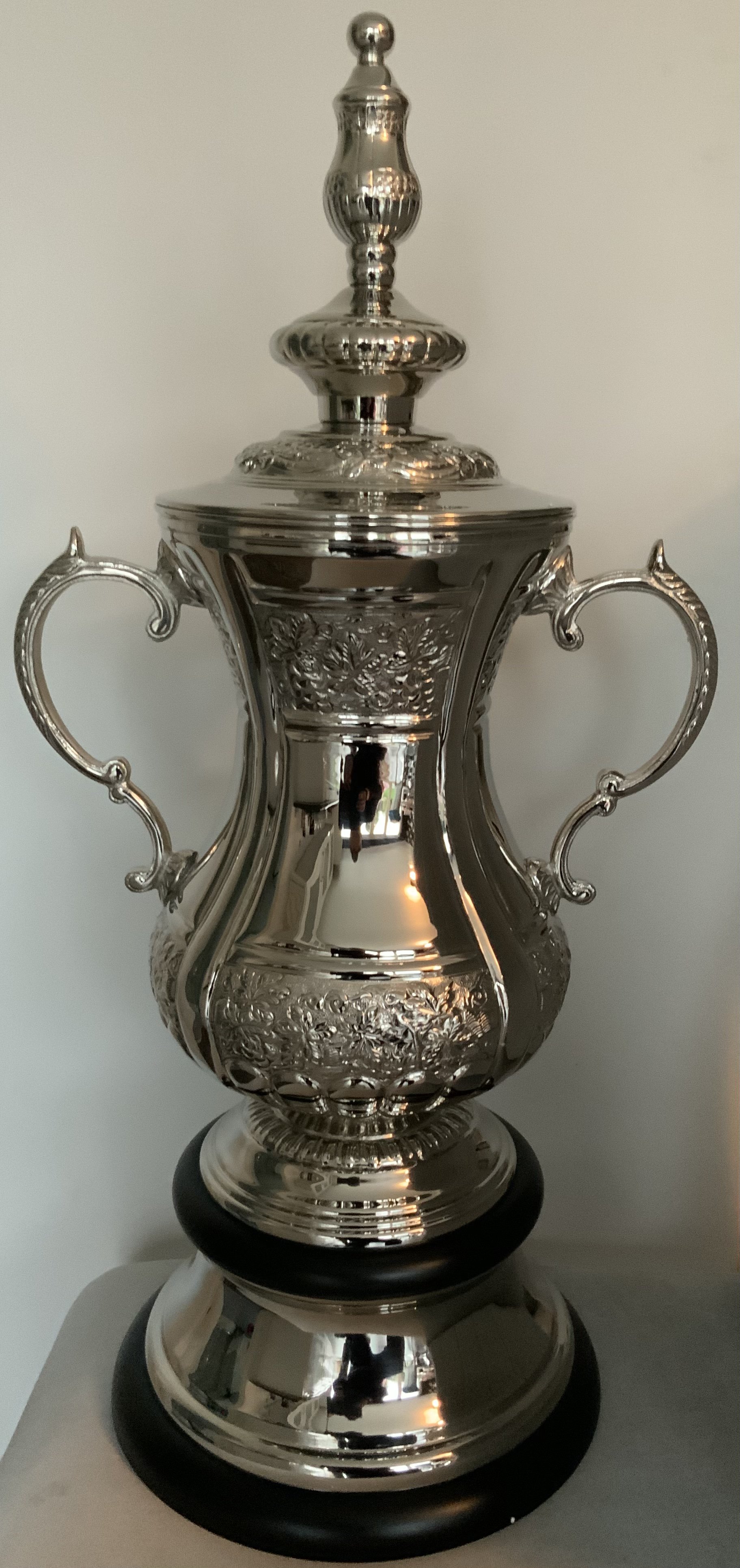 FA Cup Replica Football Trophy: Stunning full size, heavy FA Cup trophy in new condition. Superb item for promotional events or impressive display in a bar. Measures 2 feet 4 inches high (est 70cm). Exact with non removable lid so no accidents. The words Football Association Challenge Cup are not engraved for copyright purposes, but there is no mistaking this famous trophy.