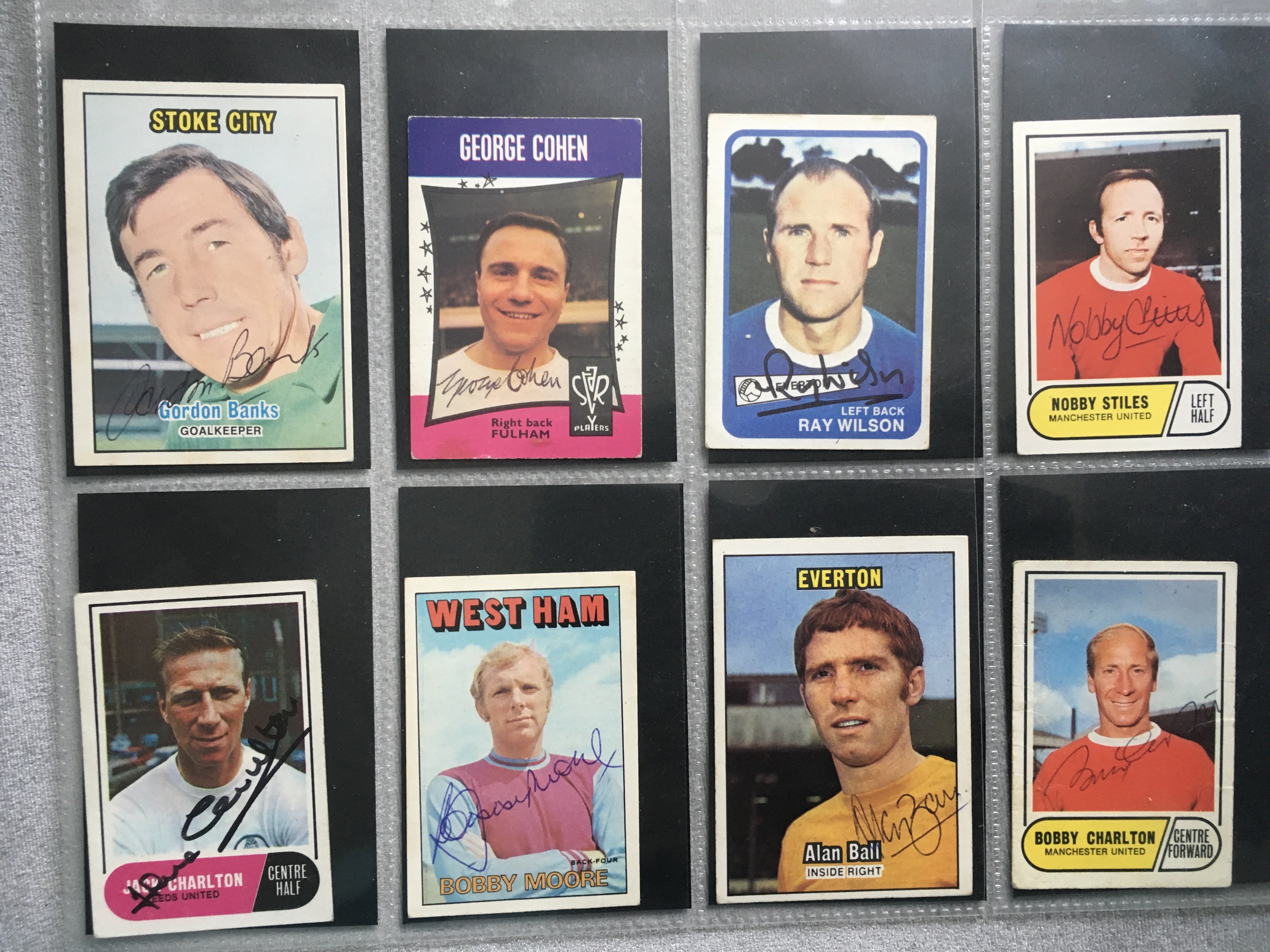 England 1966 World Cup Signed Trade Cards: A + BC cards from various sets featuring all 11 World Cup winners in club kit. Hand signed without dedication by all 11. Look great framed.