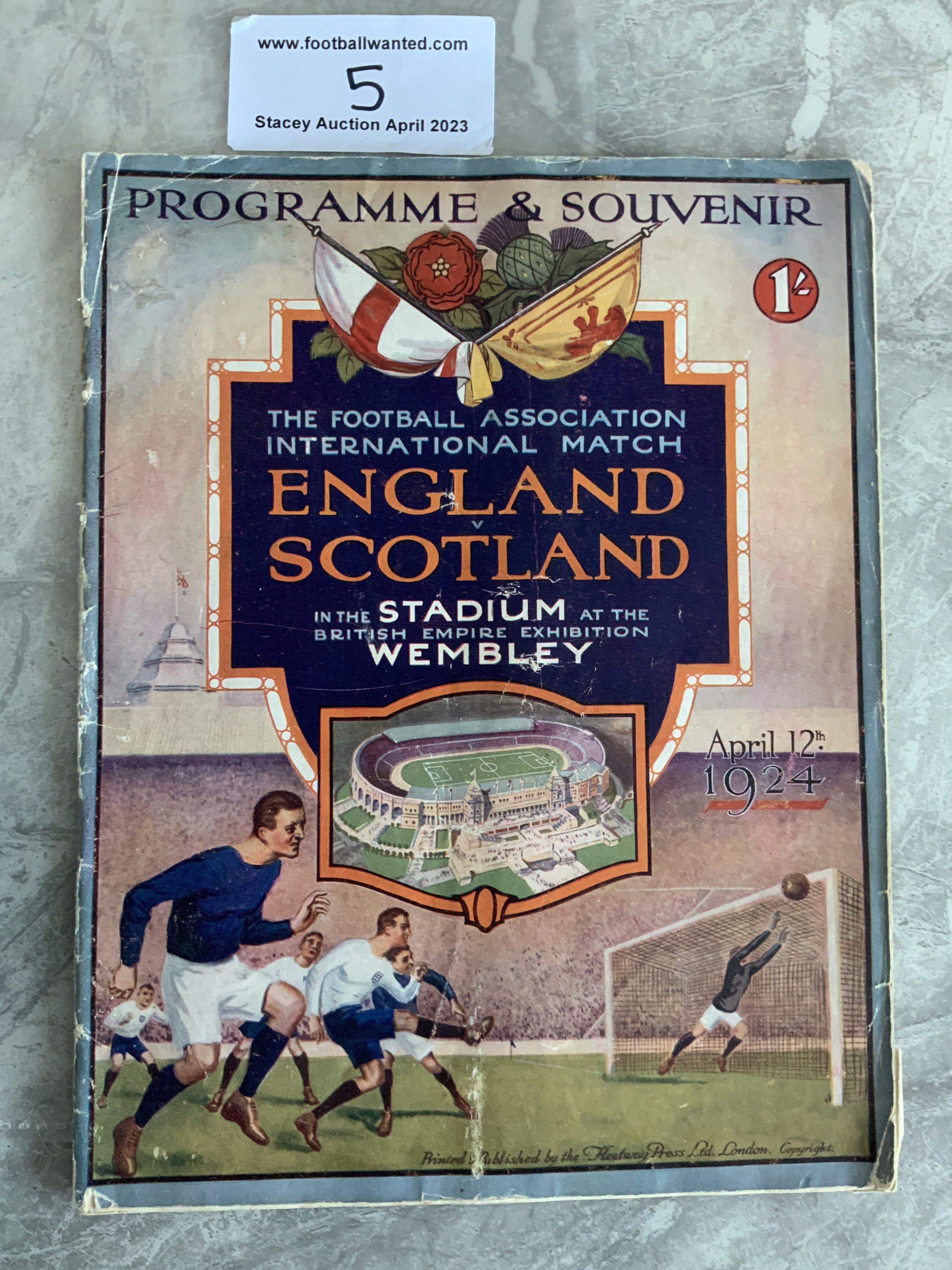 1924 England v Scotland Football Programme: Wembley became the home of England and this was the first International played at under the twin towers. Fair condition with fifty per cent split to spine. Completely original with no repairs or writing. Rare item.