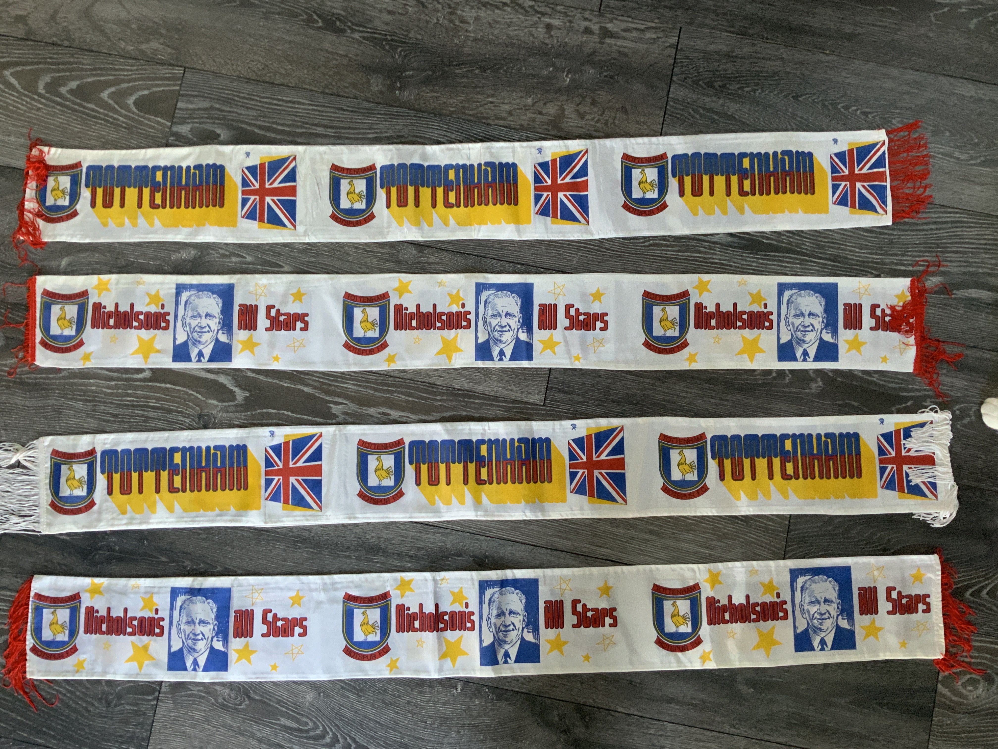Bill Nicholson Silk Tottenham Football Scarves: Nicholsons All Stars mint condition silk scarves with Tottenham badge and picture of him in the early 70s although possibly produced later. Reverse reading Tottenham with British flag. (4)